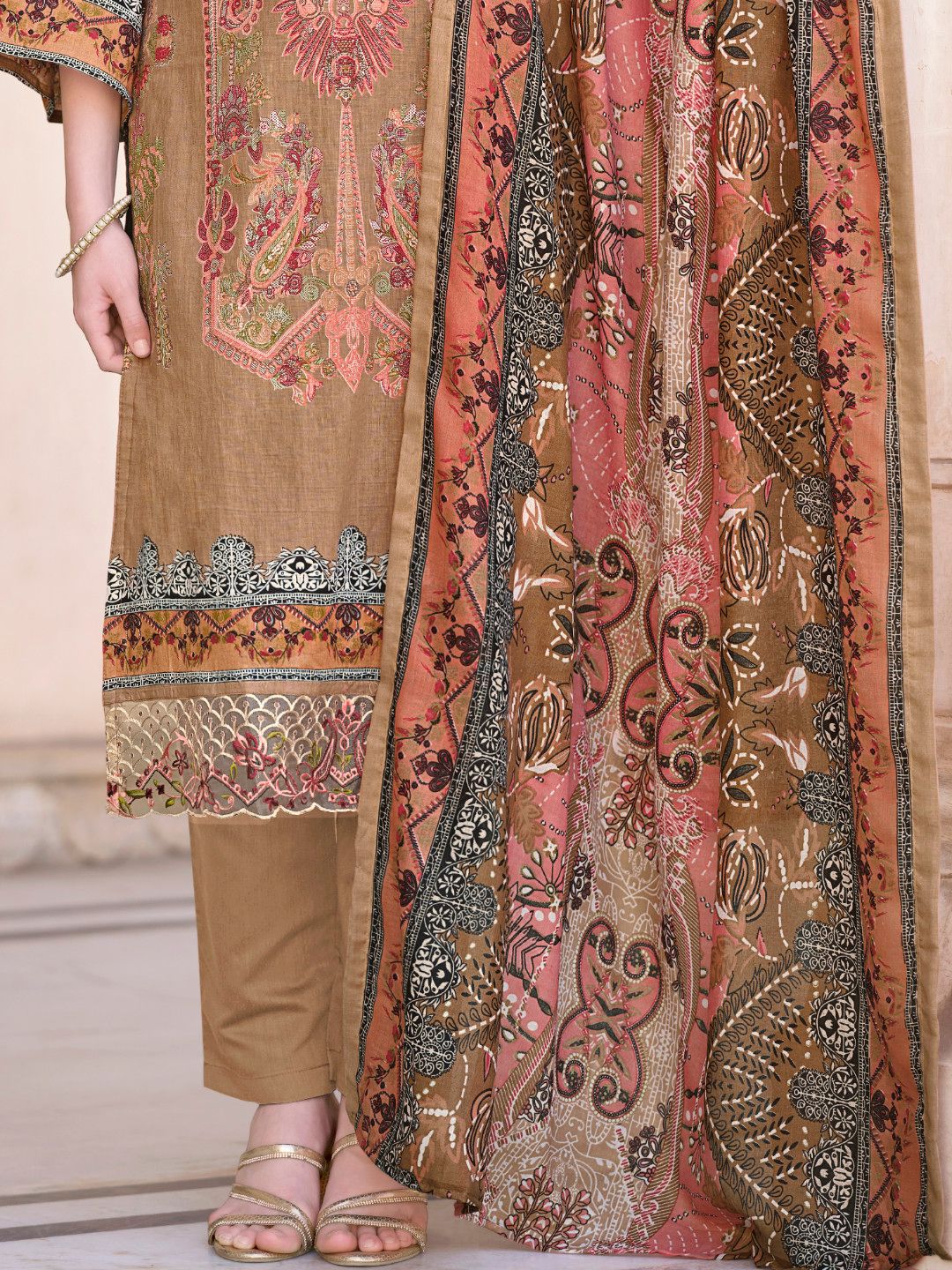 Orange colour cotton wear adds vibrance and energy – a bold choice for cultural celebrations.
