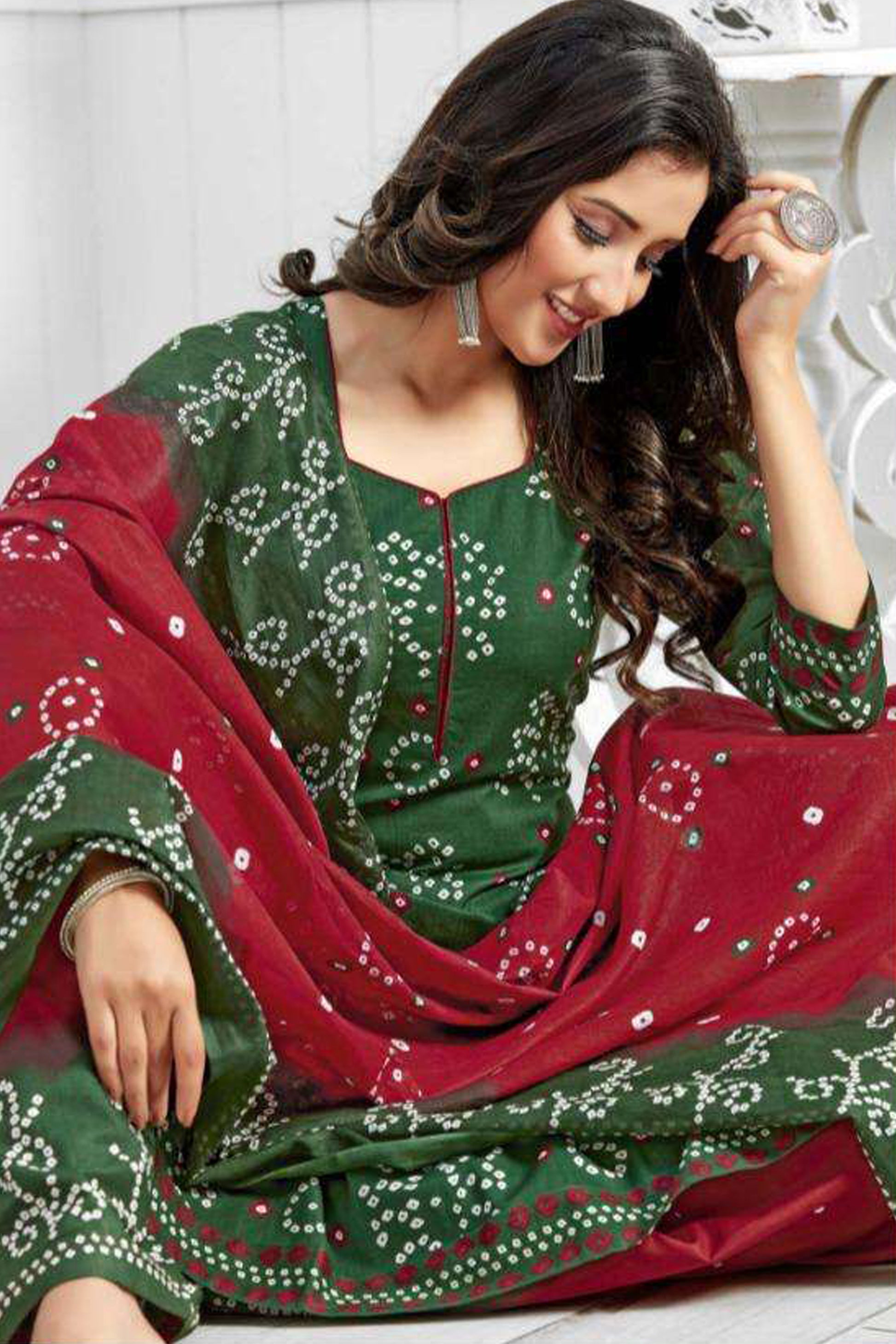 Green colour cotton wear symbolizes freshness and festivity – great for Mehndi or family gatherings.
