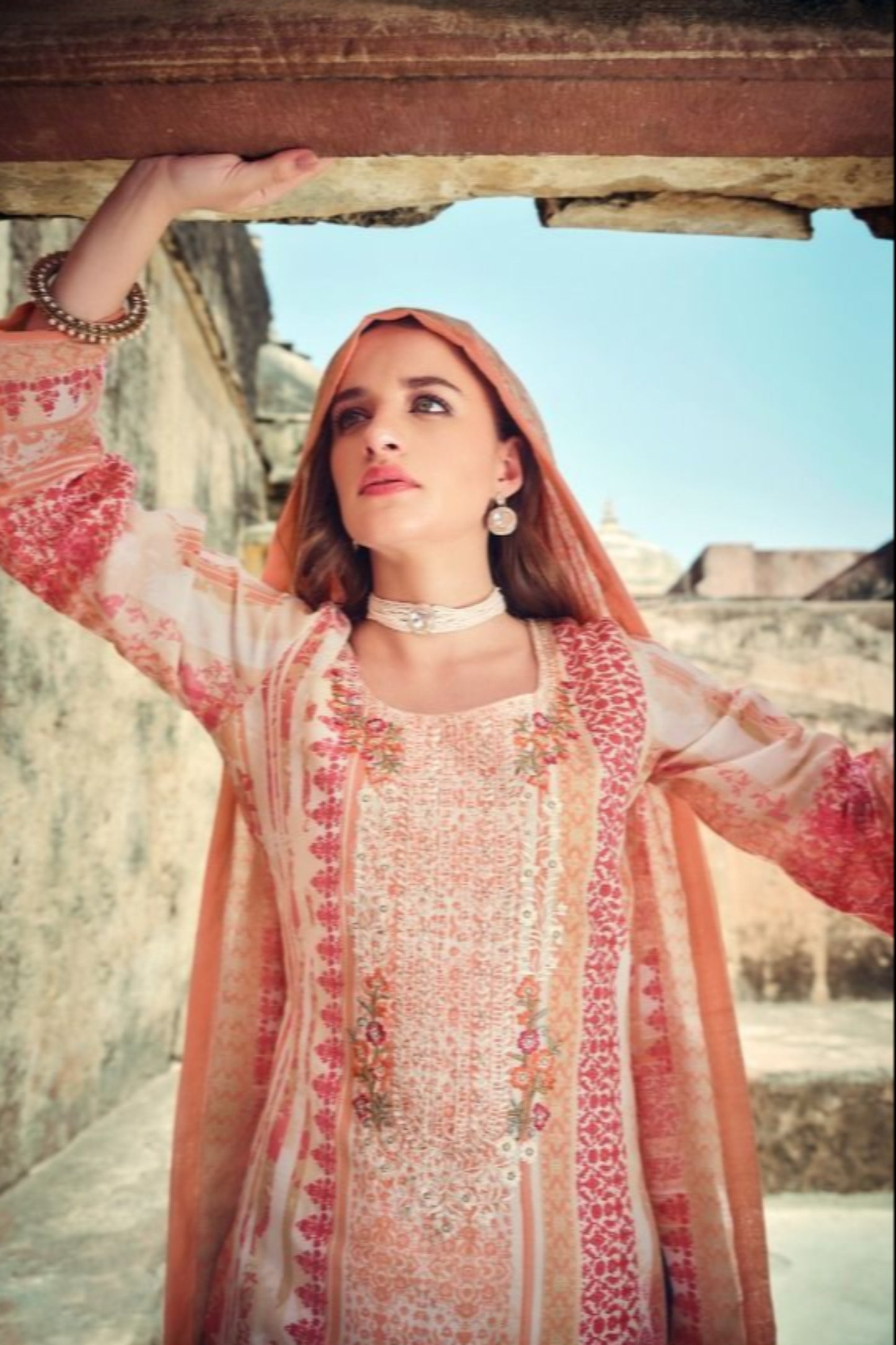 Peach color salwar kameez offers a soft, graceful look, perfect for daytime events and casual gatherings with a refreshing touch.
