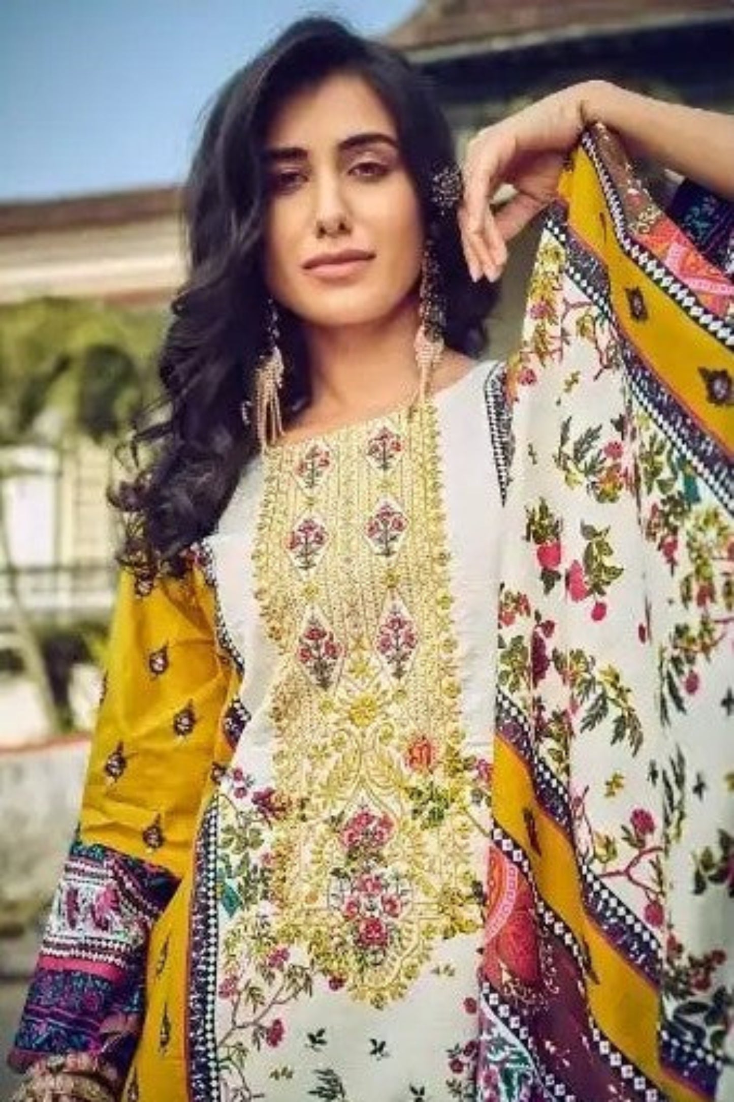 Yellow cotton outfit with a bright and joyful look, perfect for haldi functions, summer days, and cheerful celebrations.
