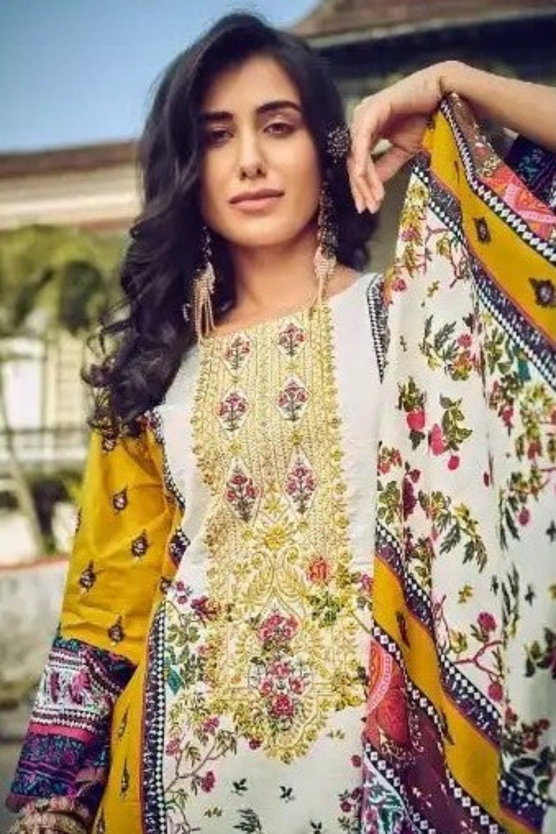 Yellow cotton outfit with a bright and joyful look, perfect for haldi functions, summer days, and cheerful celebrations.
