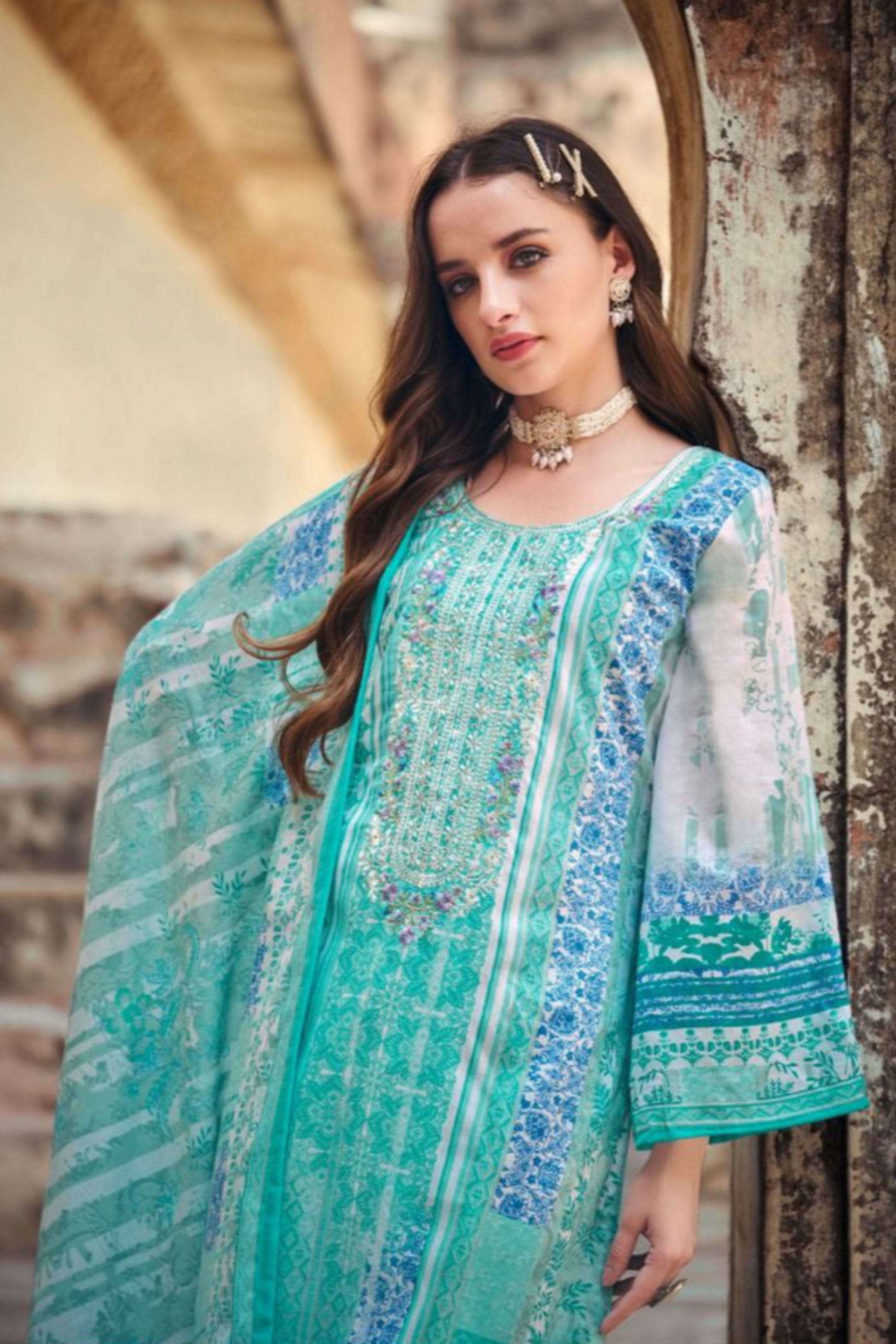 Turquoise blue salwar kameez offers a refreshing and vibrant look, ideal for daytime functions and casual wear.
