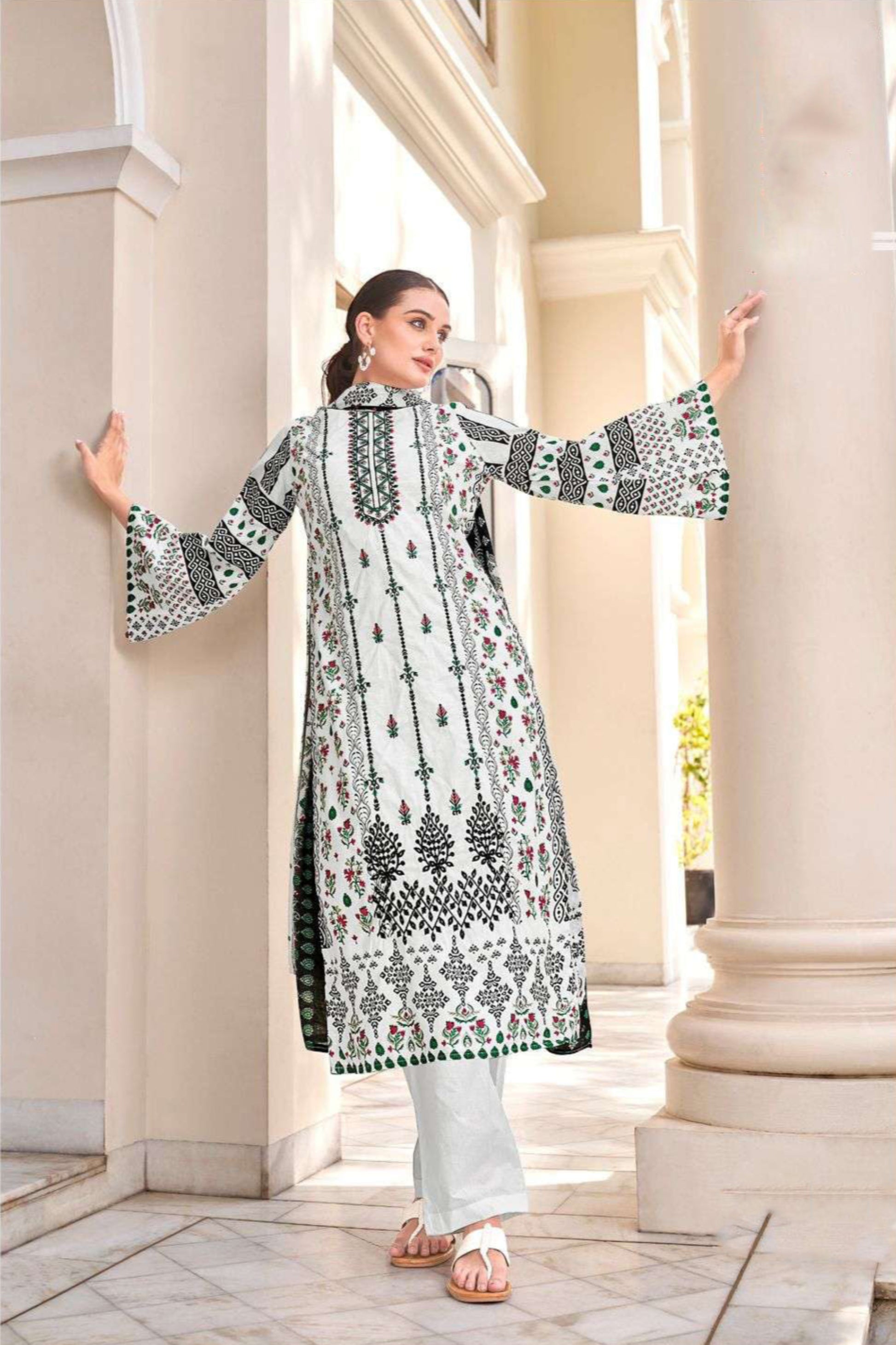 White cotton outfit with a clean and timeless look, perfect for daily wear, spiritual events, and summer gatherings.
