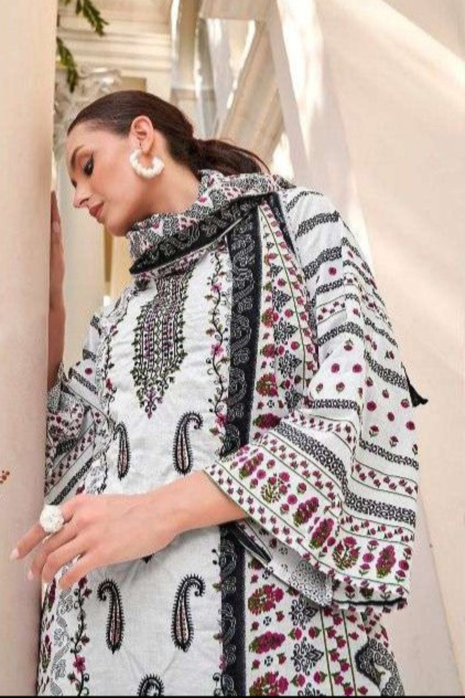 Chic white cotton outfit with a fresh and breezy vibe, ideal for everyday wear, summer outings, and festive mornings.
