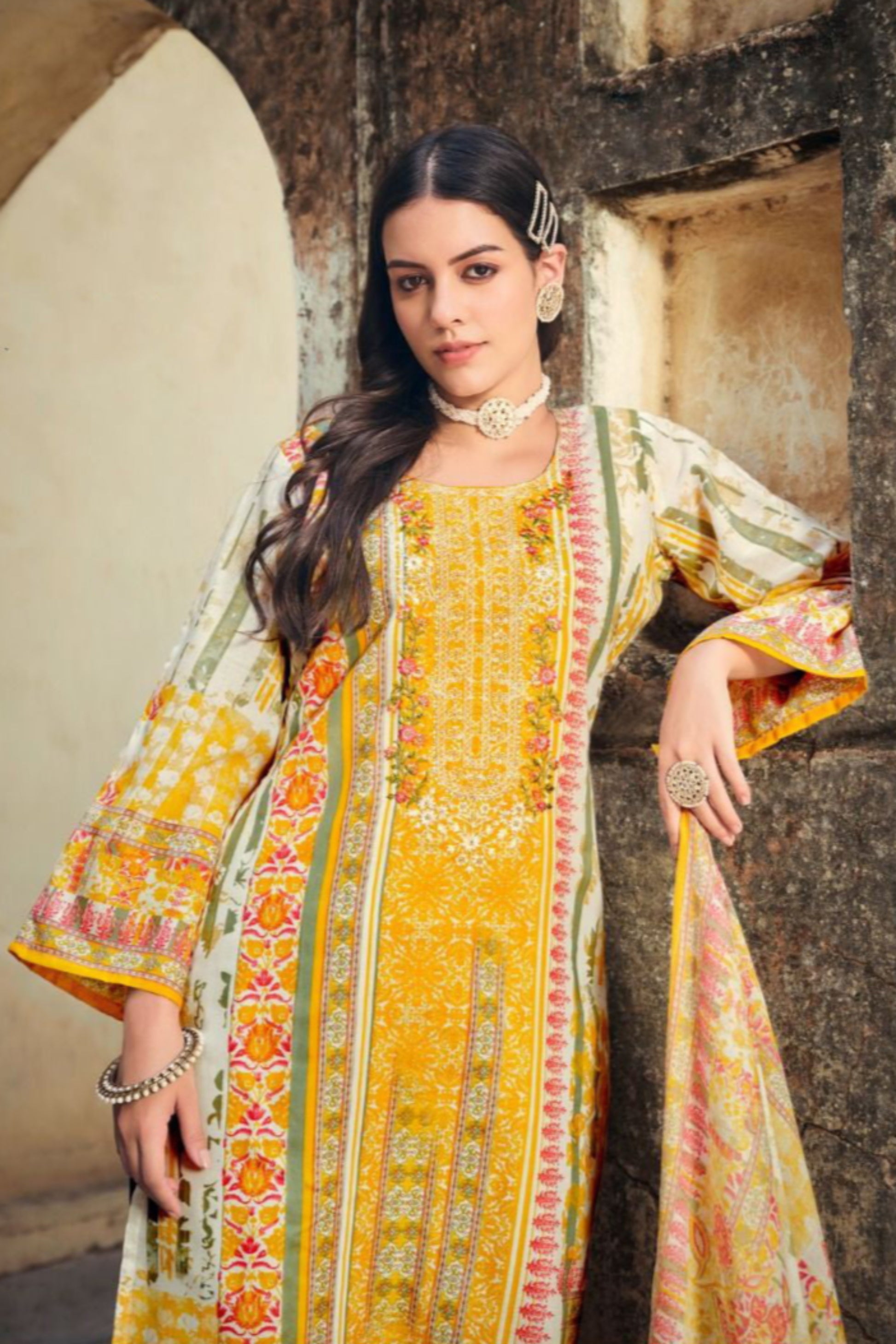 Yellow color salwar kameez radiates warmth and vibrance, making it an ideal pick for festive occasions and cheerful daywear.
