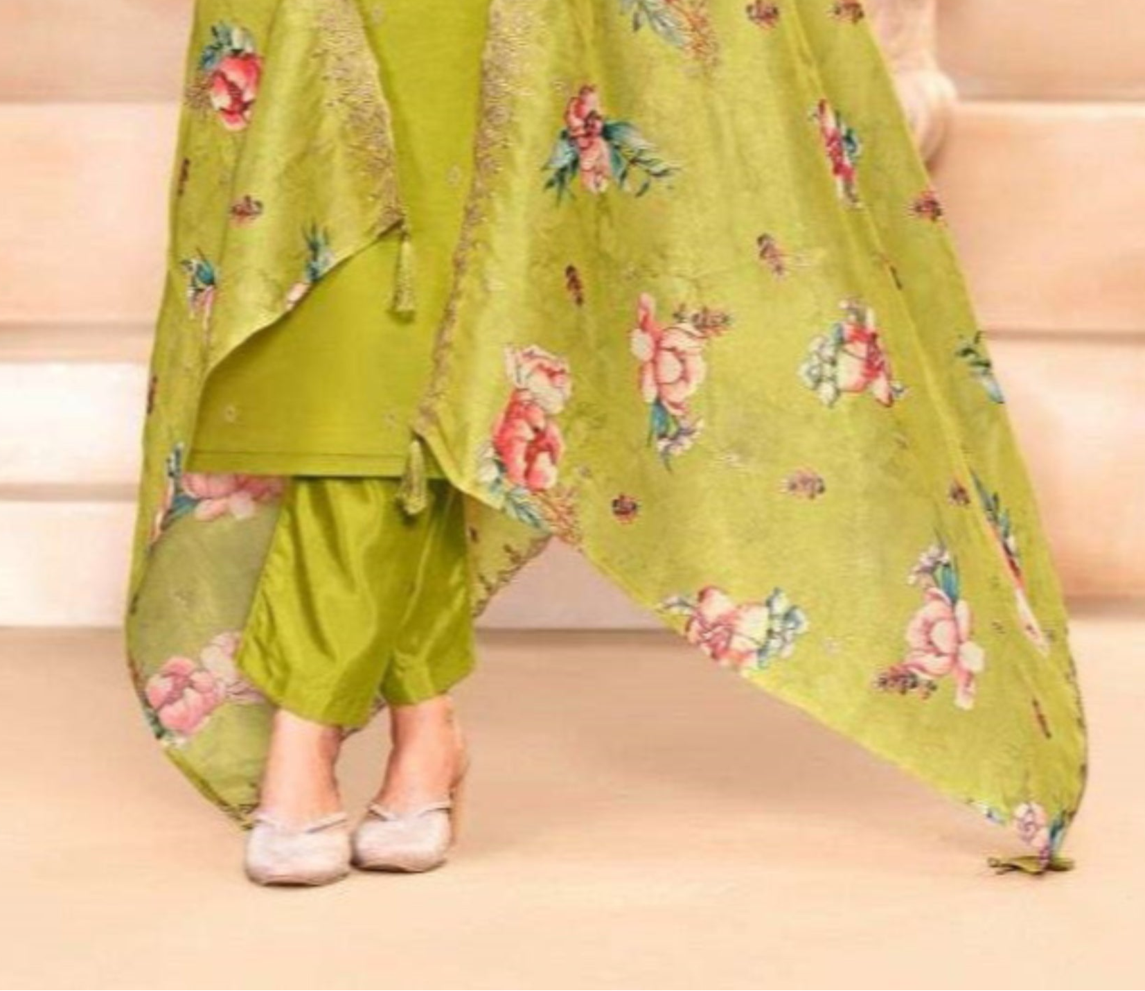 Green cotton wear brings a fresh and earthy vibe, perfect for a graceful everyday look with a natural touch.
