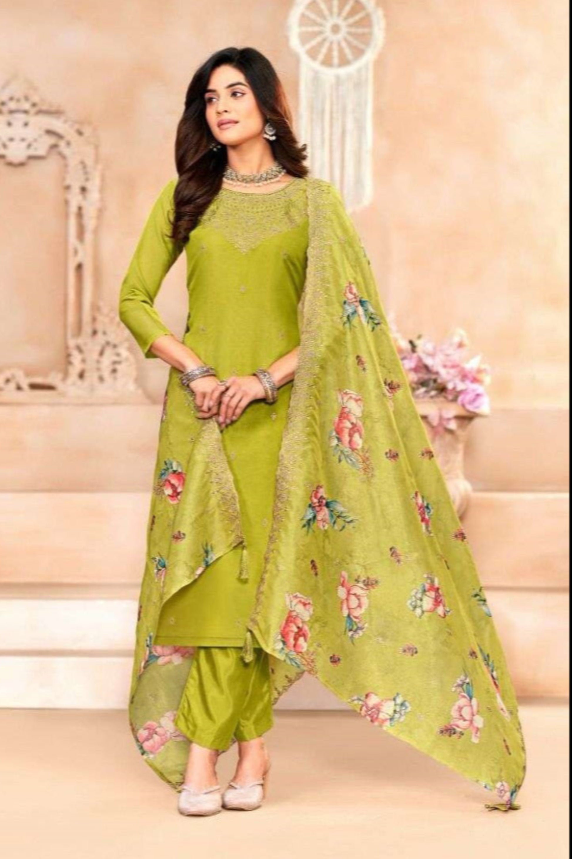 Green cotton wear brings a fresh and earthy vibe, perfect for a graceful everyday look with a natural touch.
