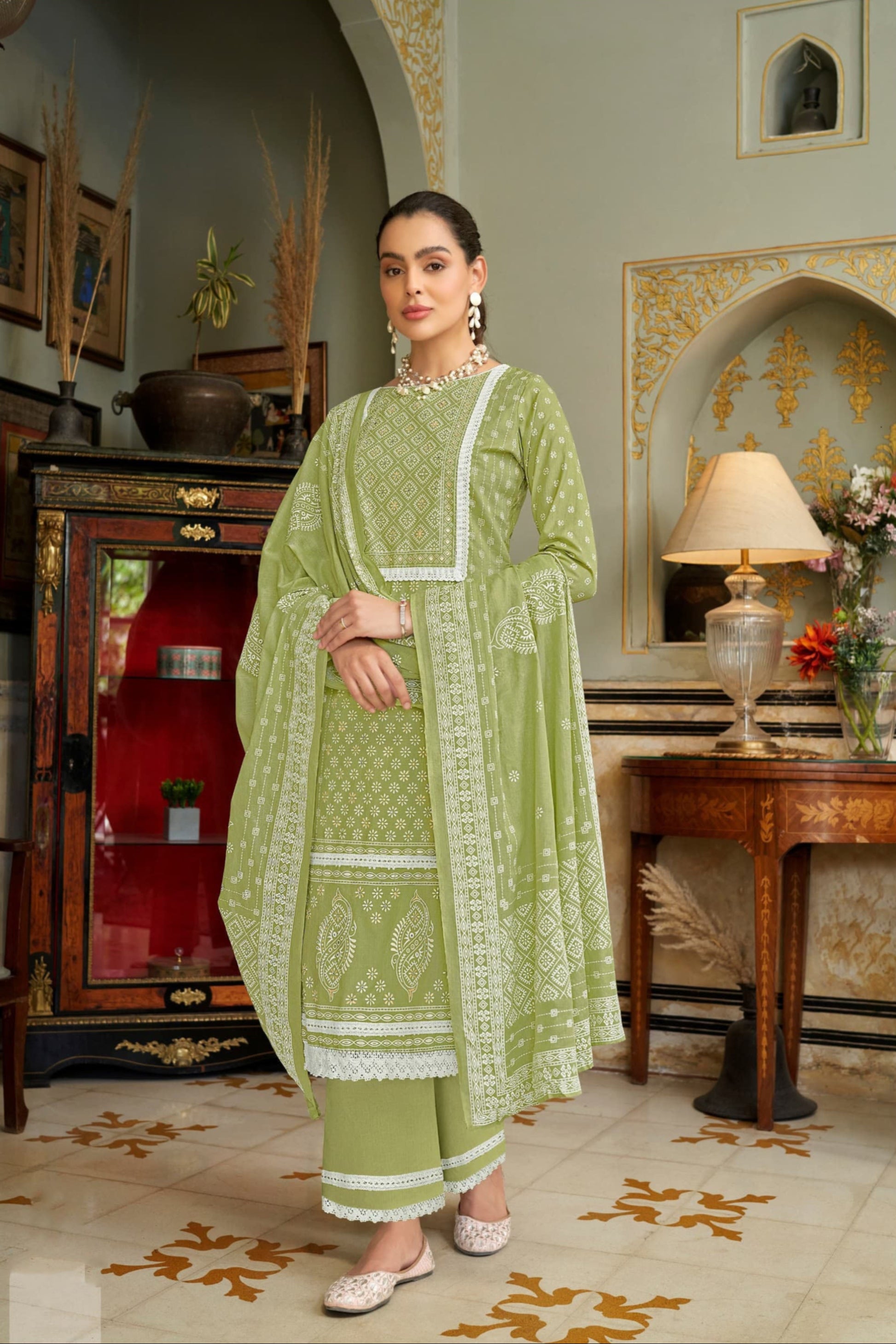 Green colour cotton wear symbolizes freshness and festivity – great for Mehndi or family gatherings.
