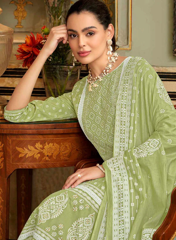 Green colour cotton wear symbolizes freshness and festivity – great for Mehndi or family gatherings.
