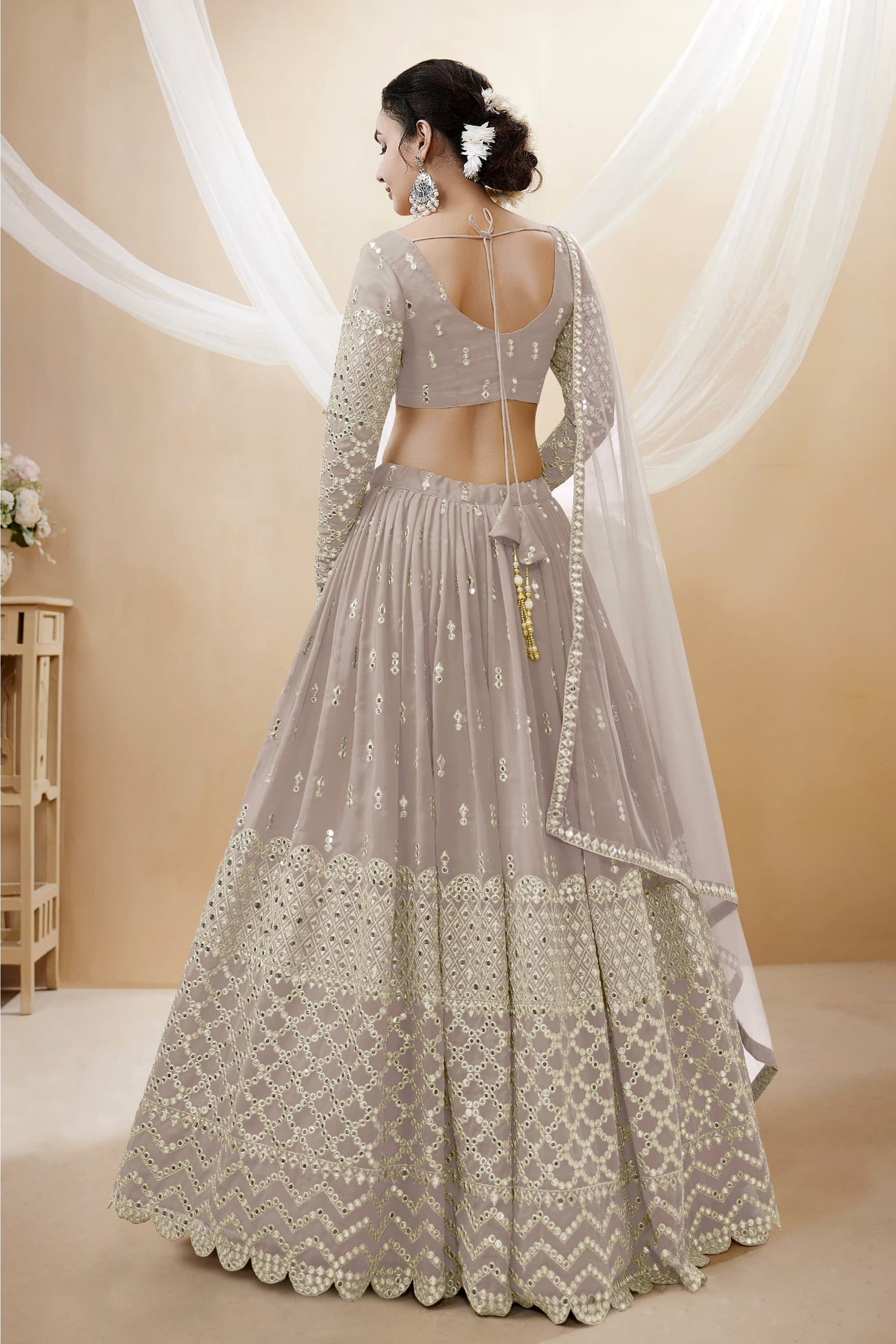 "Chic lehengas for Holi events in America."
