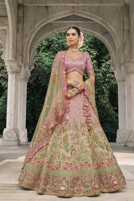 “Pastel pink and green floral embroidered designer lehenga choli with intricate zari, sequin work, and net dupatta