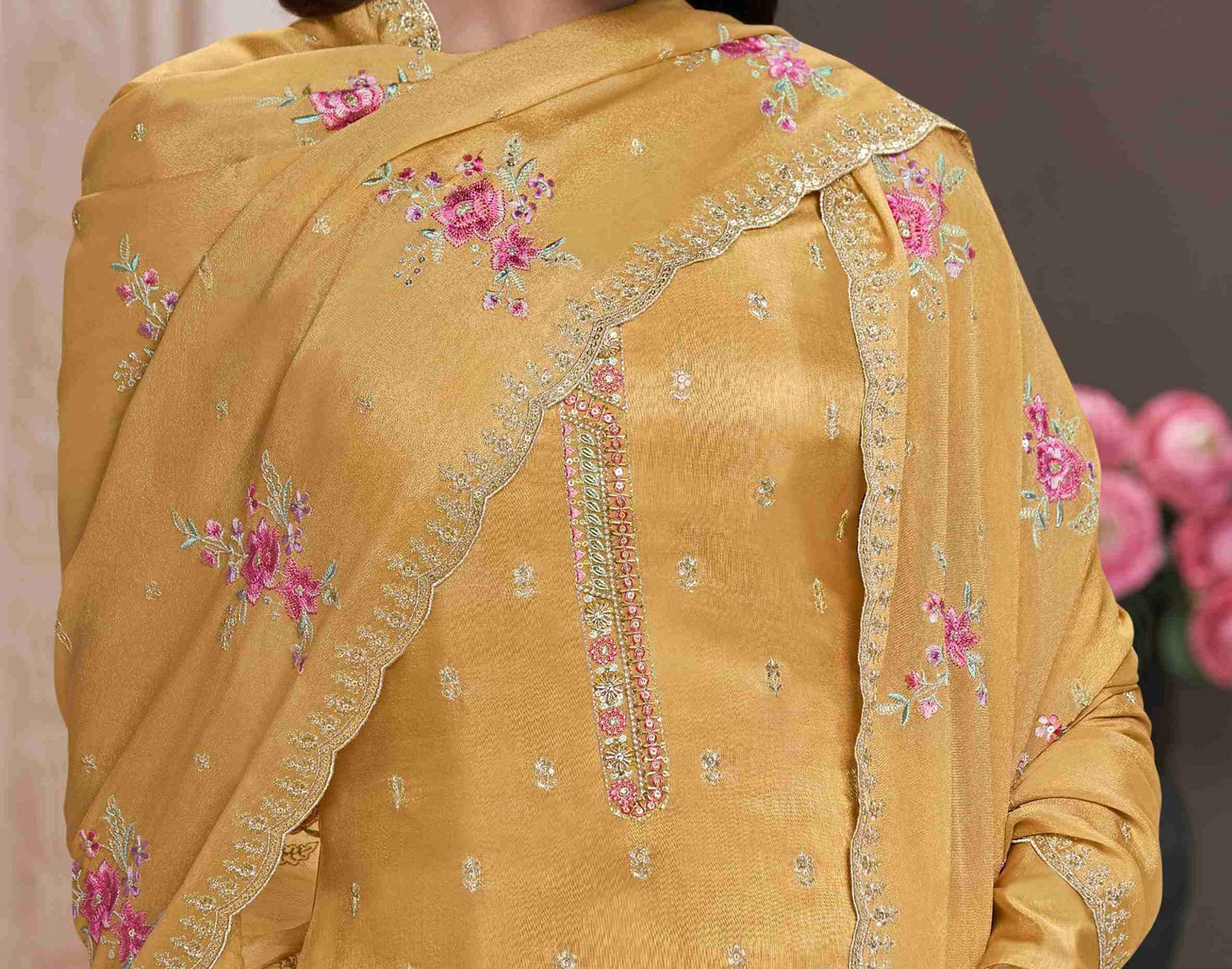 Yellow salwar kameez is bright and happy. Good for haldi or sunny events.
