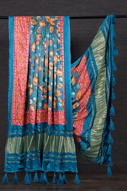 Blue color Gaji silk fabric with printed dupatta, designed with elegant traditional motifs that elevate the style of any festive salwar kameez.
