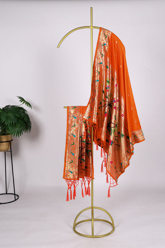 Dark orange color Gaji silk fabric with printed dupatta, featuring bold traditional prints that bring a warm and festive elegance to your salwar kameez outfit.
