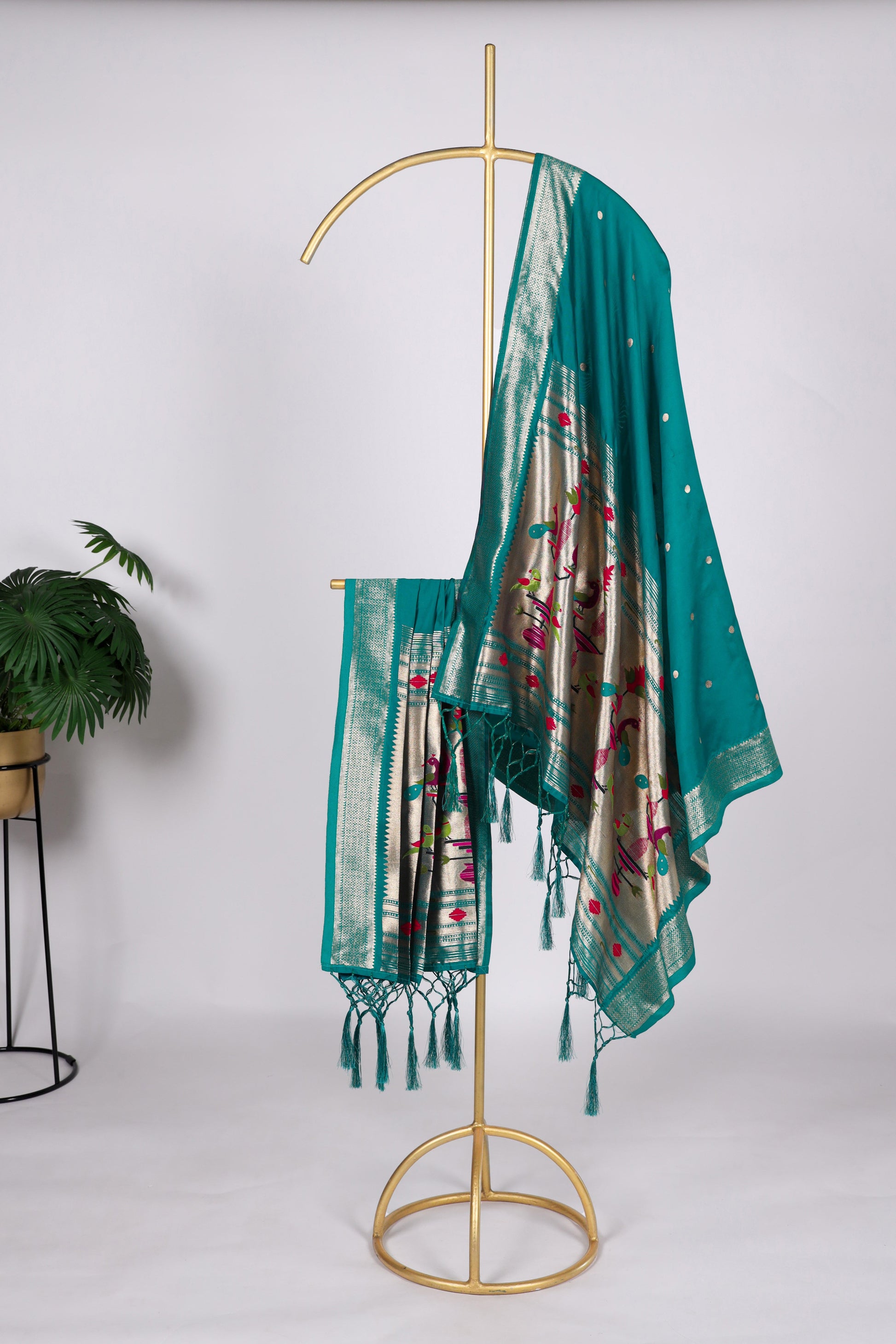 Teal blue color Gaji silk fabric with printed dupatta, adorned with elegant ethnic patterns that bring a refreshing and stylish touch to your salwar kameez ensemble.
