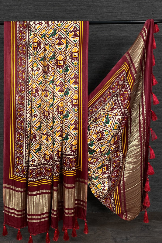 Burgundy red color Gaji silk fabric with printed dupatta, adorned with elegant motifs that enhance the richness of ethnic salwar kameez attire.
