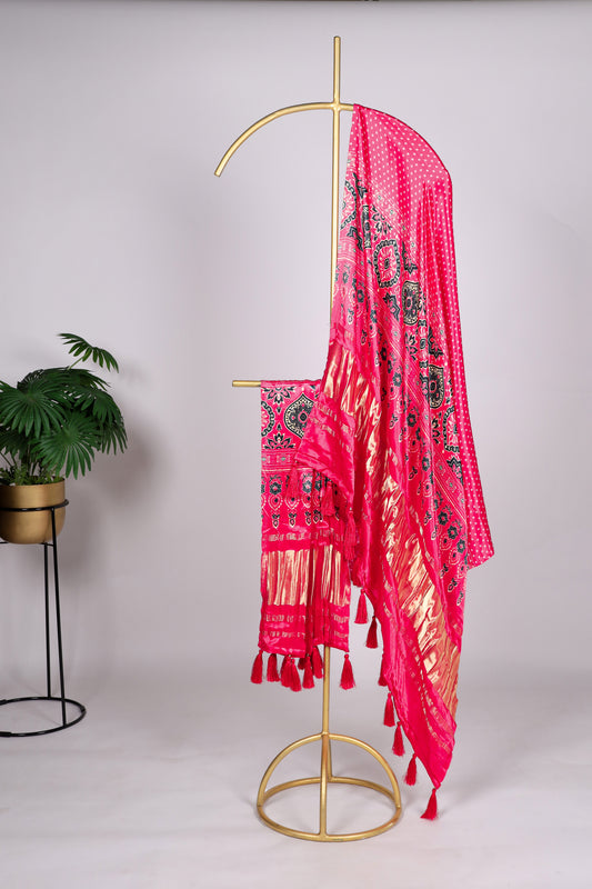 Bright pink color Gaji silk fabric with printed dupatta, featuring lively traditional prints that add a vibrant and stylish flair to your salwar kameez ensemble.
