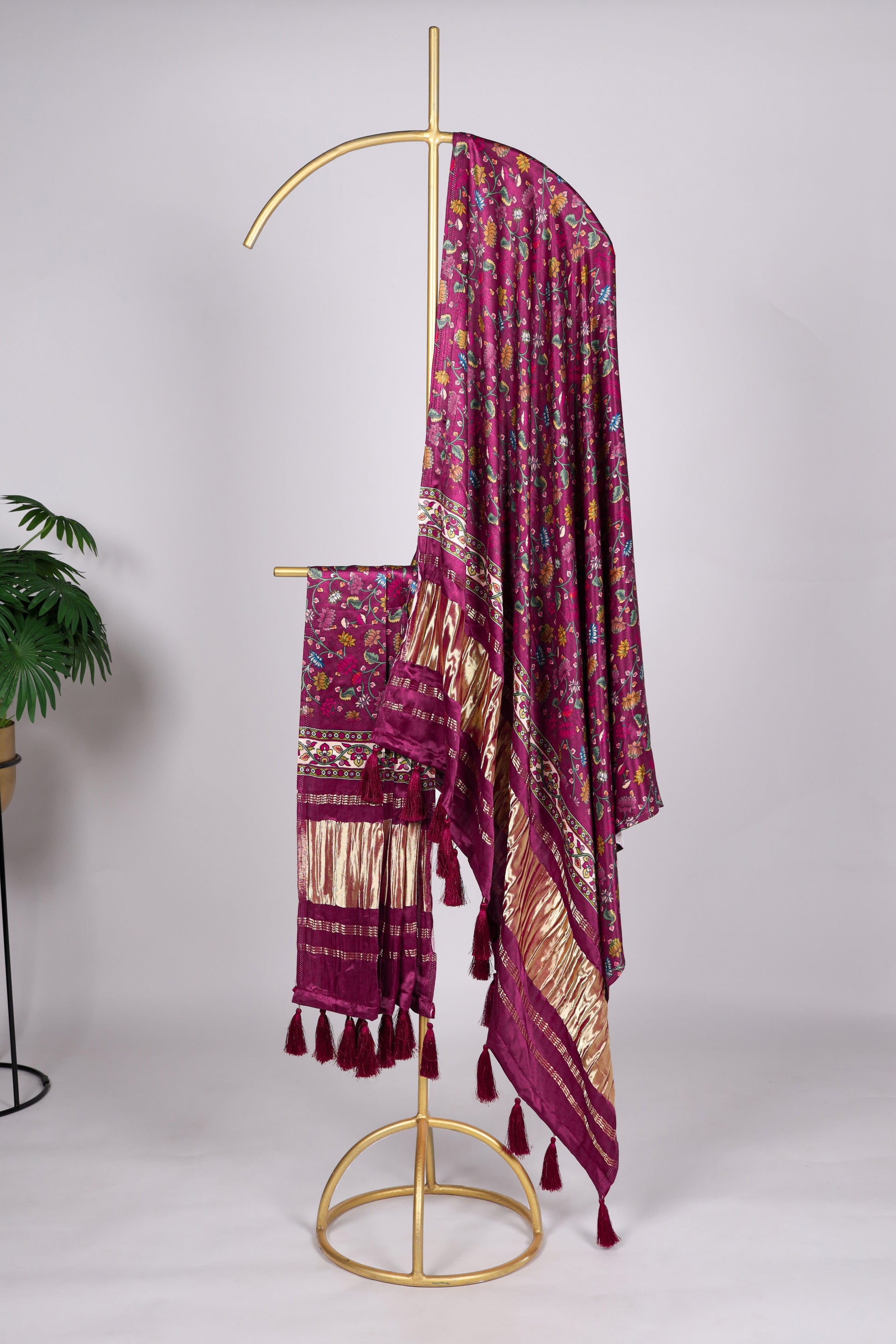 Wine color Gaji silk fabric with printed dupatta, adorned with rich and elegant motifs that bring a regal touch to your traditional salwar kameez attire.
