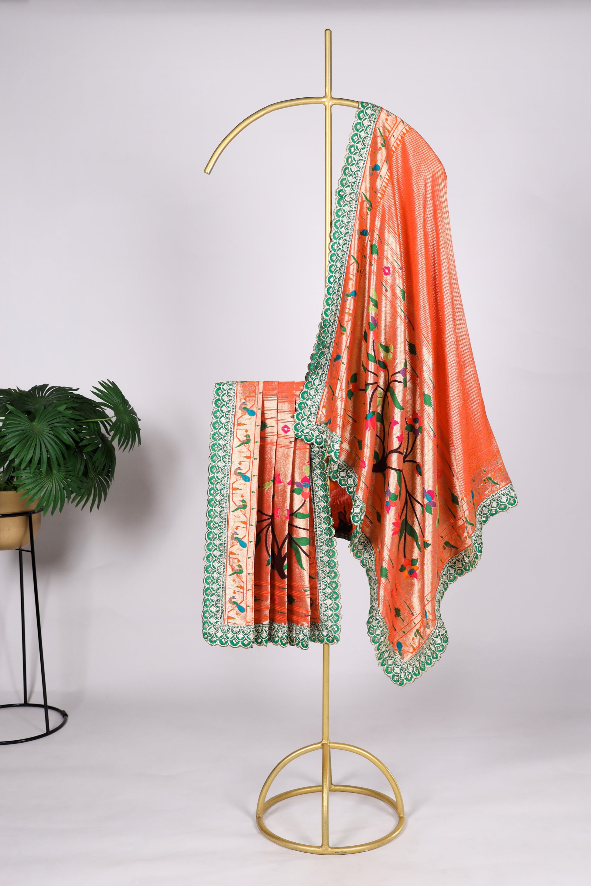 Orange color Gaji silk fabric with printed dupatta, designed with bold and festive patterns that bring warmth and vibrance to your salwar kameez attire.
