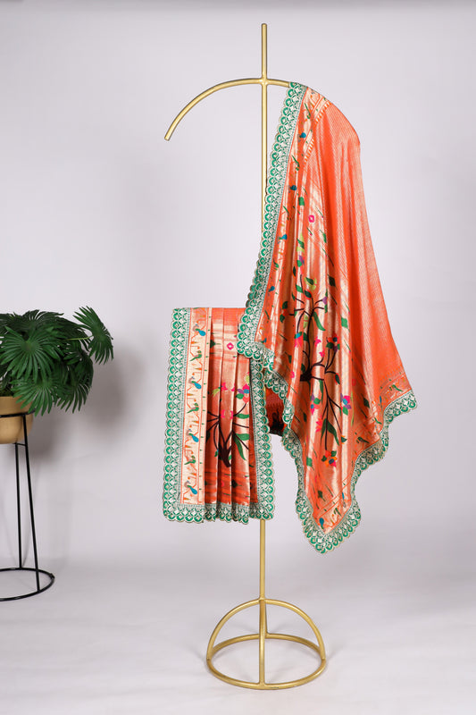 Orange color Gaji silk fabric with printed dupatta, designed with bold and festive patterns that bring warmth and vibrance to your salwar kameez attire.
