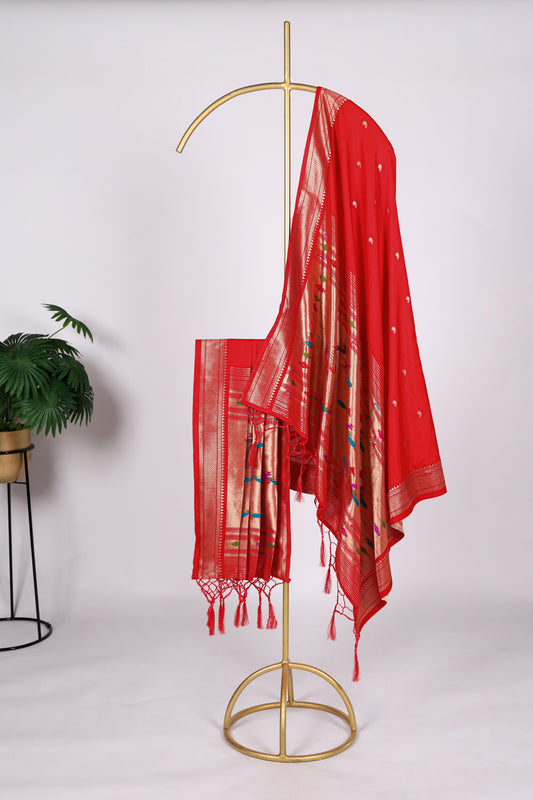 Red color Gaji silk fabric with printed dupatta, featuring vibrant traditional motifs that add a bold and festive charm to your salwar kameez attire.
