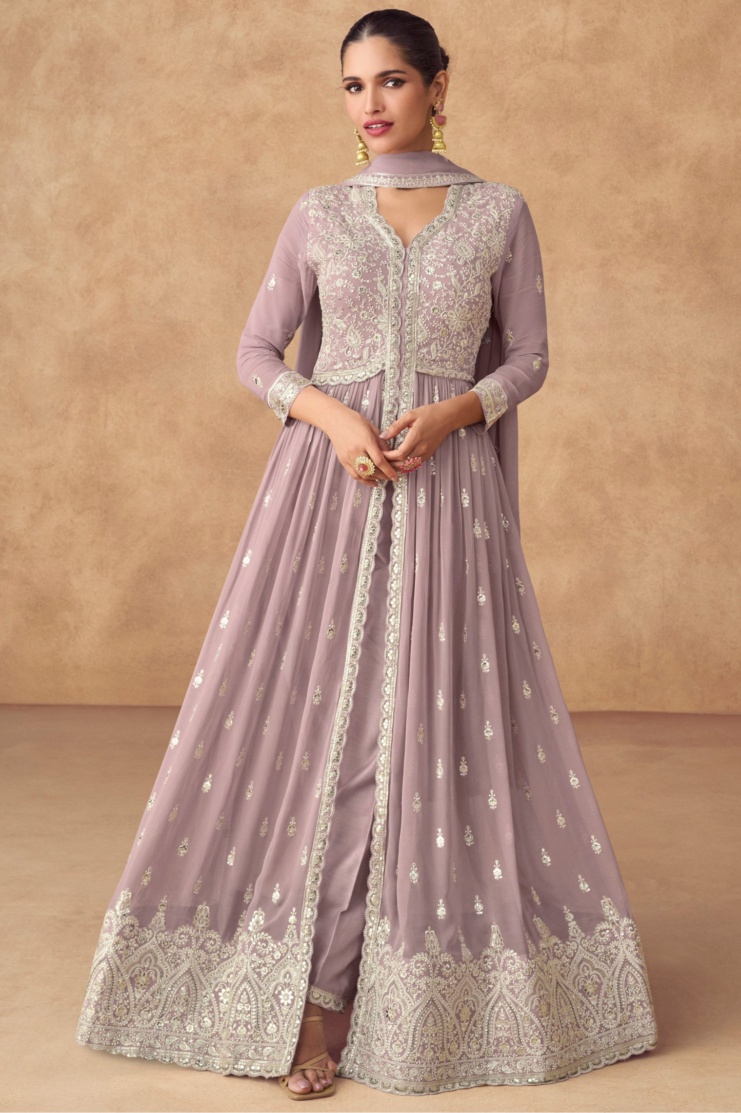 A Woman Modeling Traditional Lavender Anarkali Gown