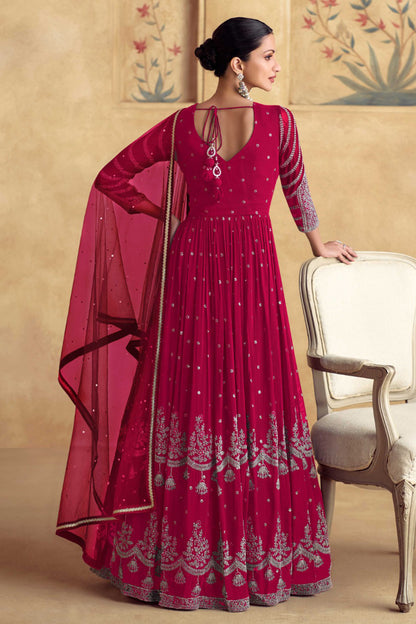 Stylish Dark Pink Embroidery Worked Real Georgette Anarkali Gown With Net Dupatta 