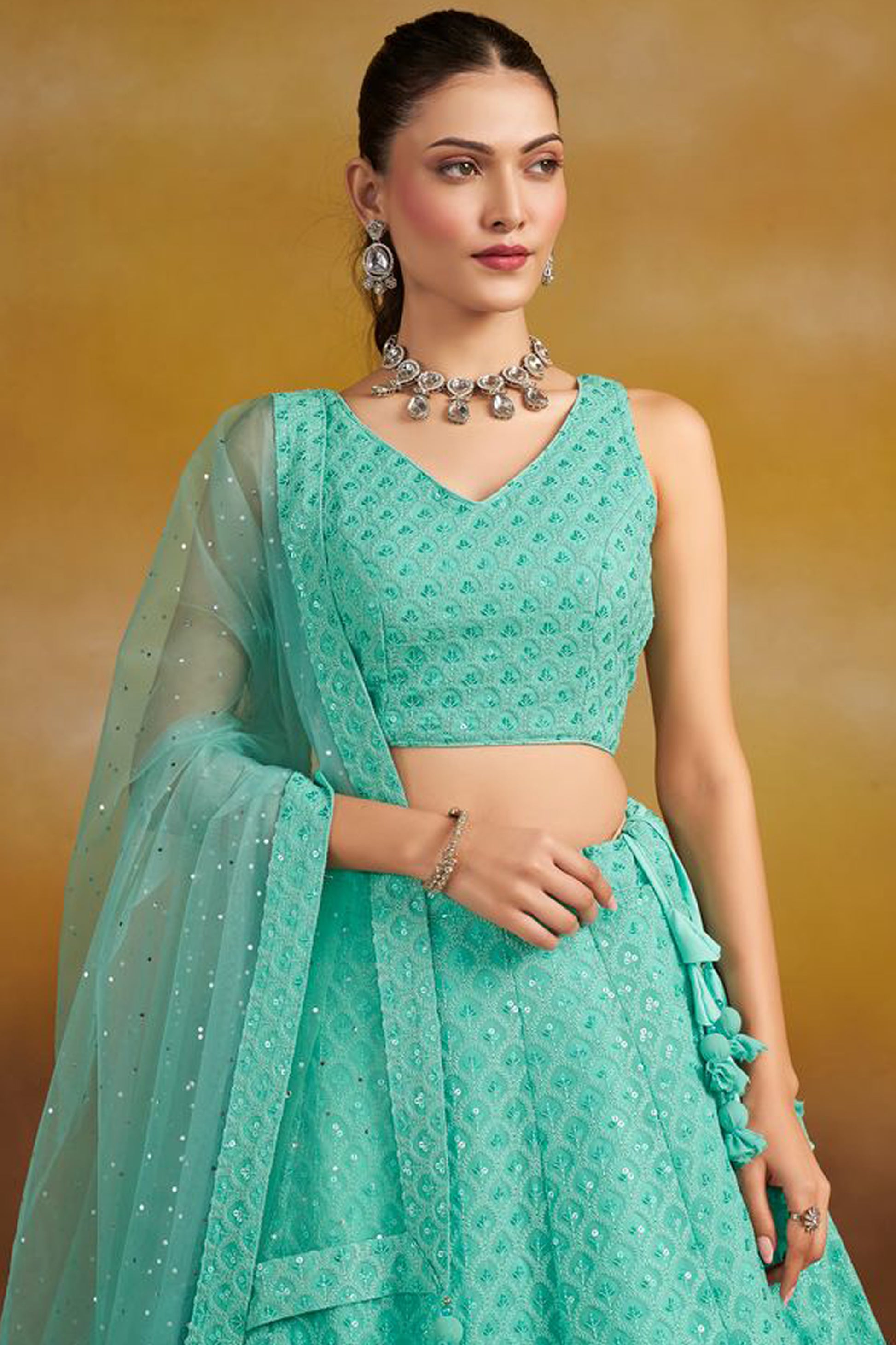 Close-p Embroidery Detail Of Designer Wedding Lehenga With Zari Work