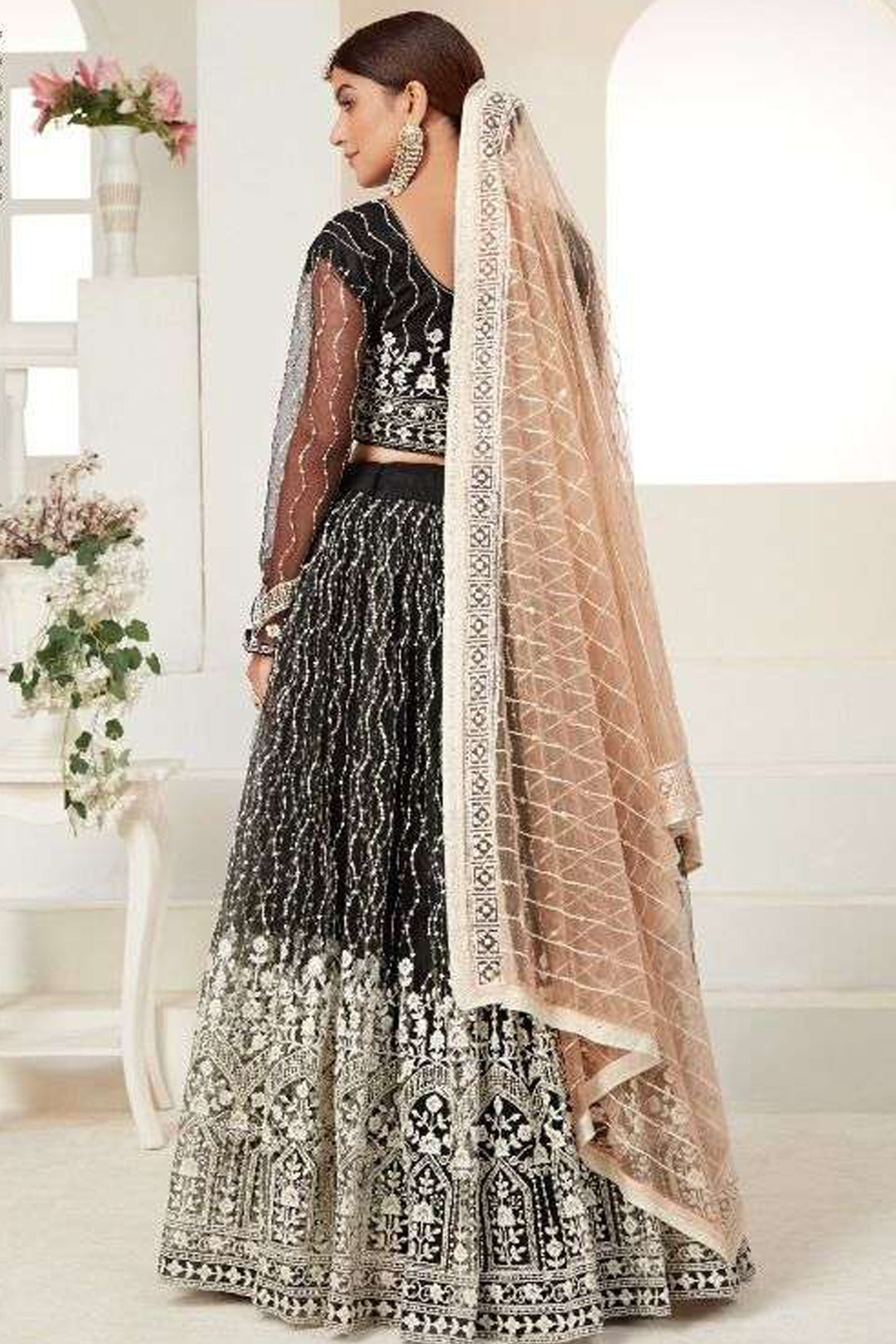 Close-Up of Heavy Net Fabric And Embroidery Detailing On Pakistani Lehenga Choli