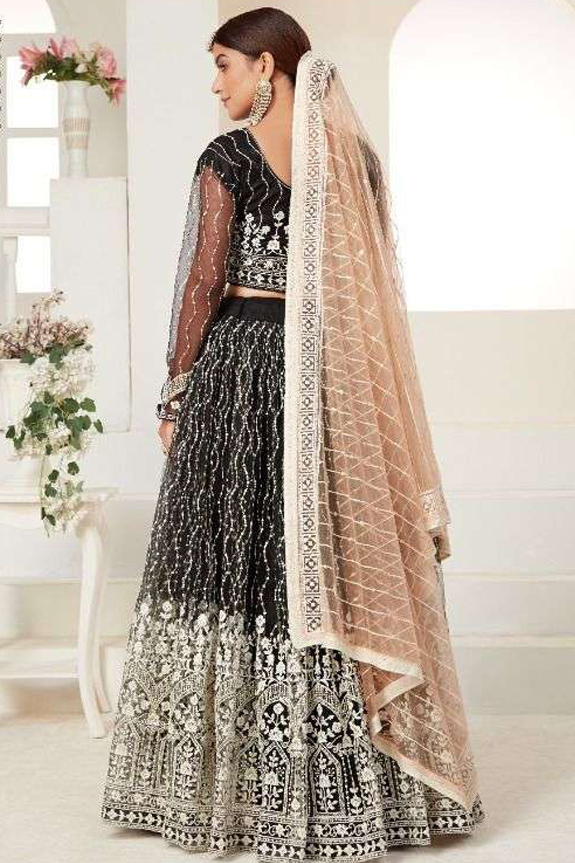 Close-Up of Heavy Net Fabric And Embroidery Detailing On Pakistani Lehenga Choli