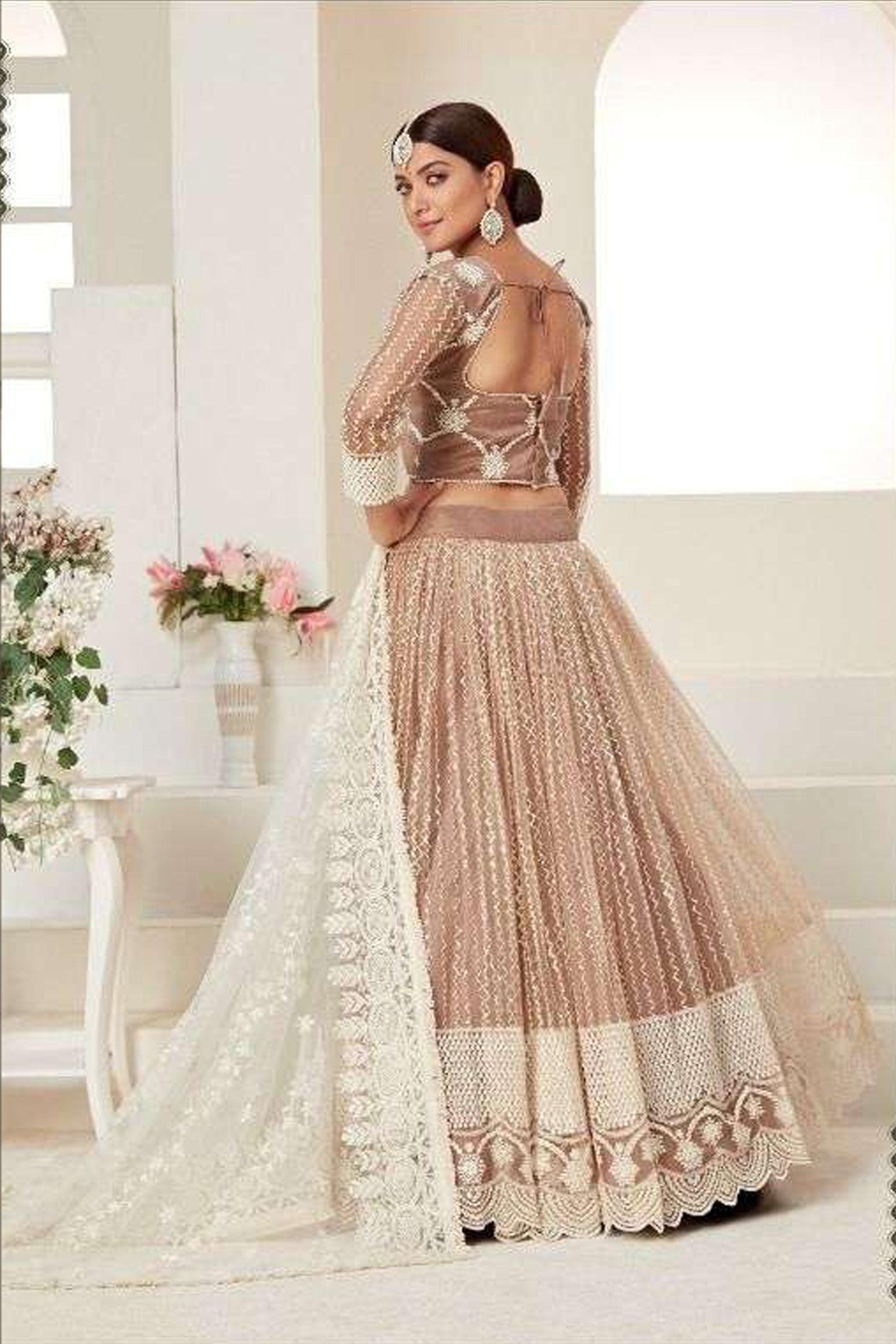 Beige Bridal Lehenga Choli Side View Showing Embroidery Details And Art Silk Inner