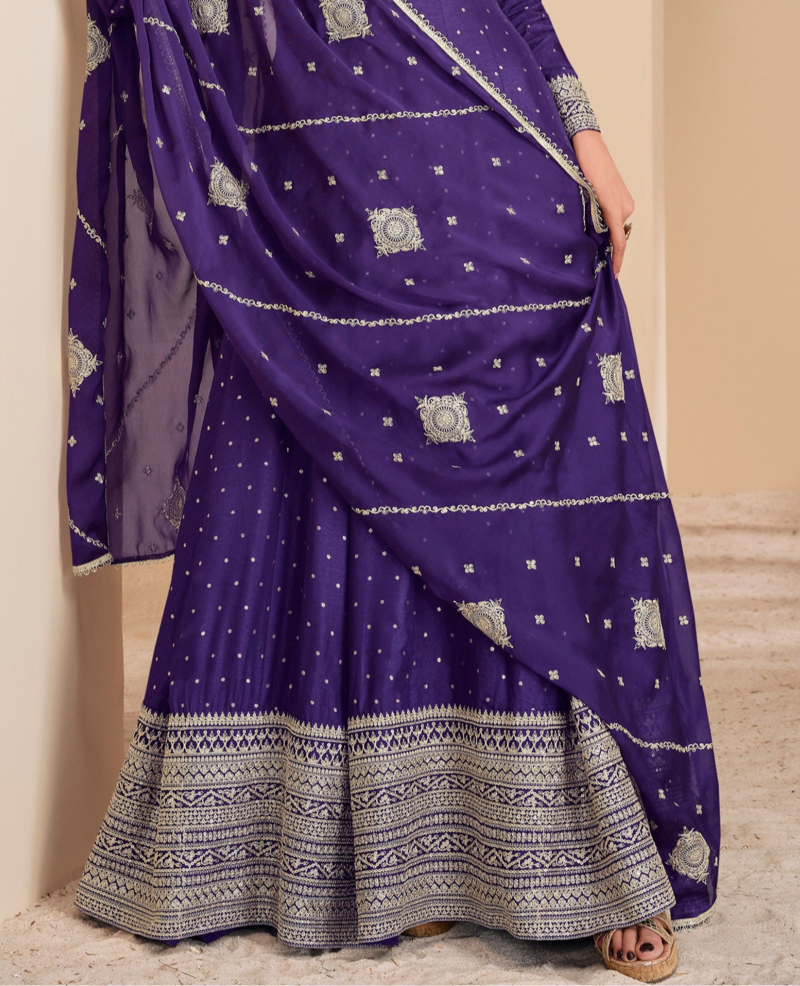 Indian bridal Anarkali suit with embroidered dupatta side view