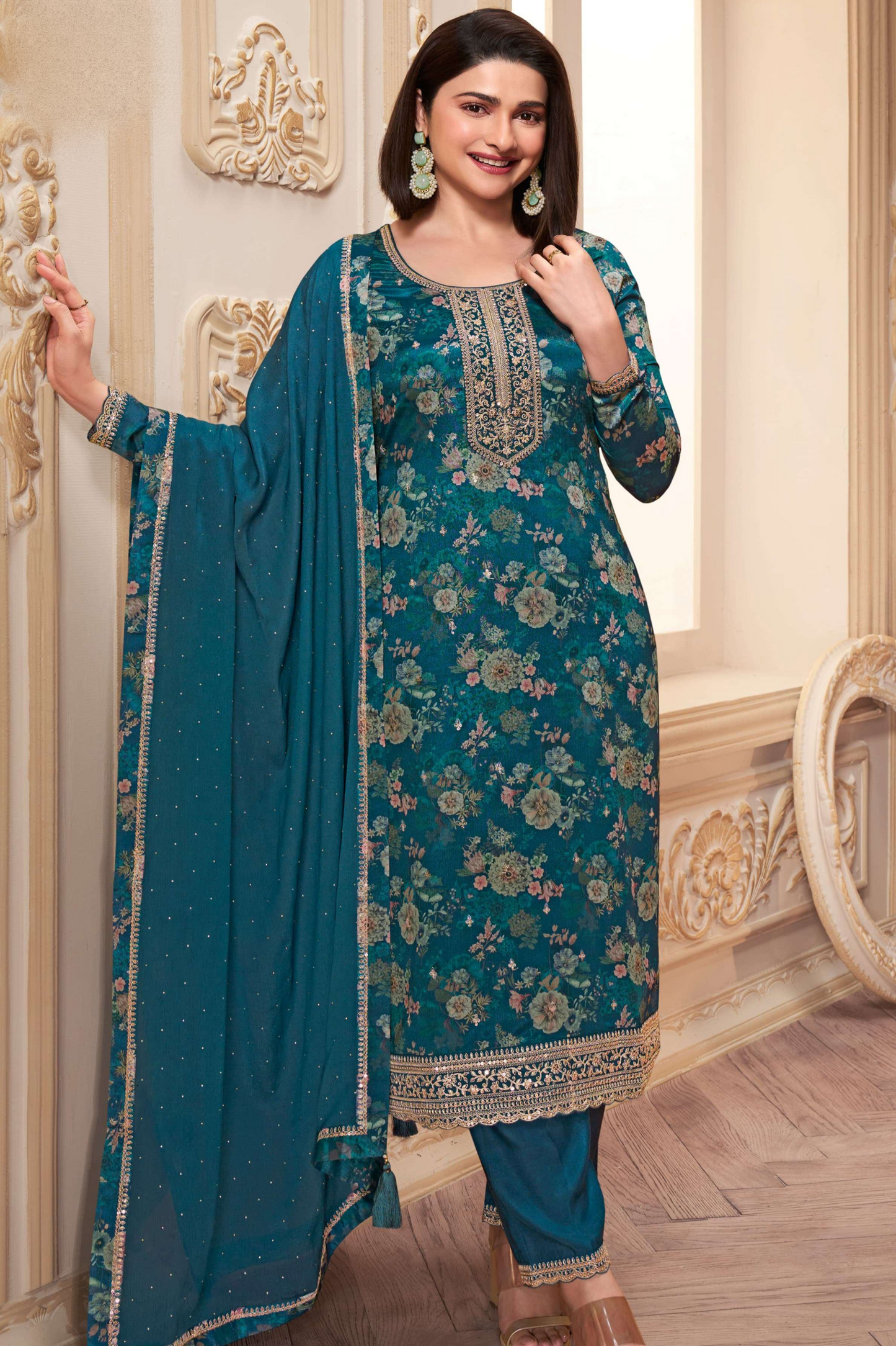 Teal salwar kameez is cool and refreshing. It blends blue and green for a unique look
