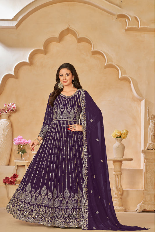 A Woman Modeling Purple Anarkali Dupatta Gown Suit With Embroidery work