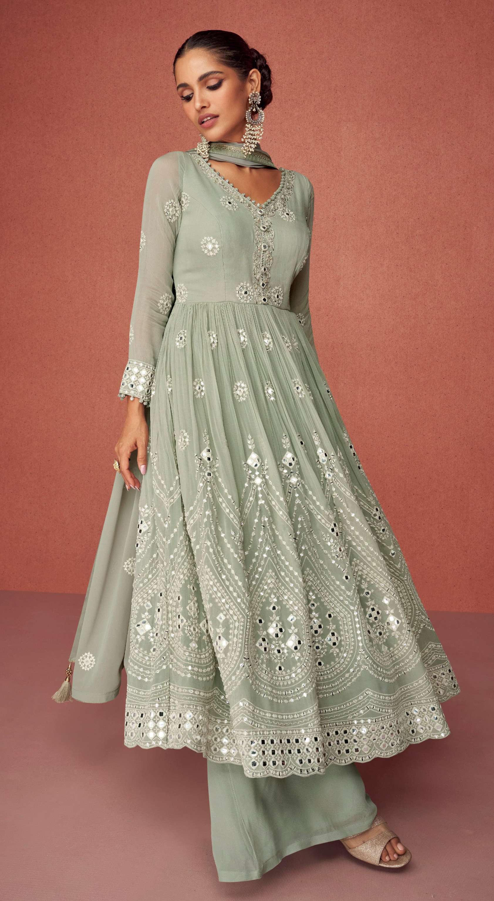 Green Georgette Palazzo Suit With Intricate Thread Embroidery.