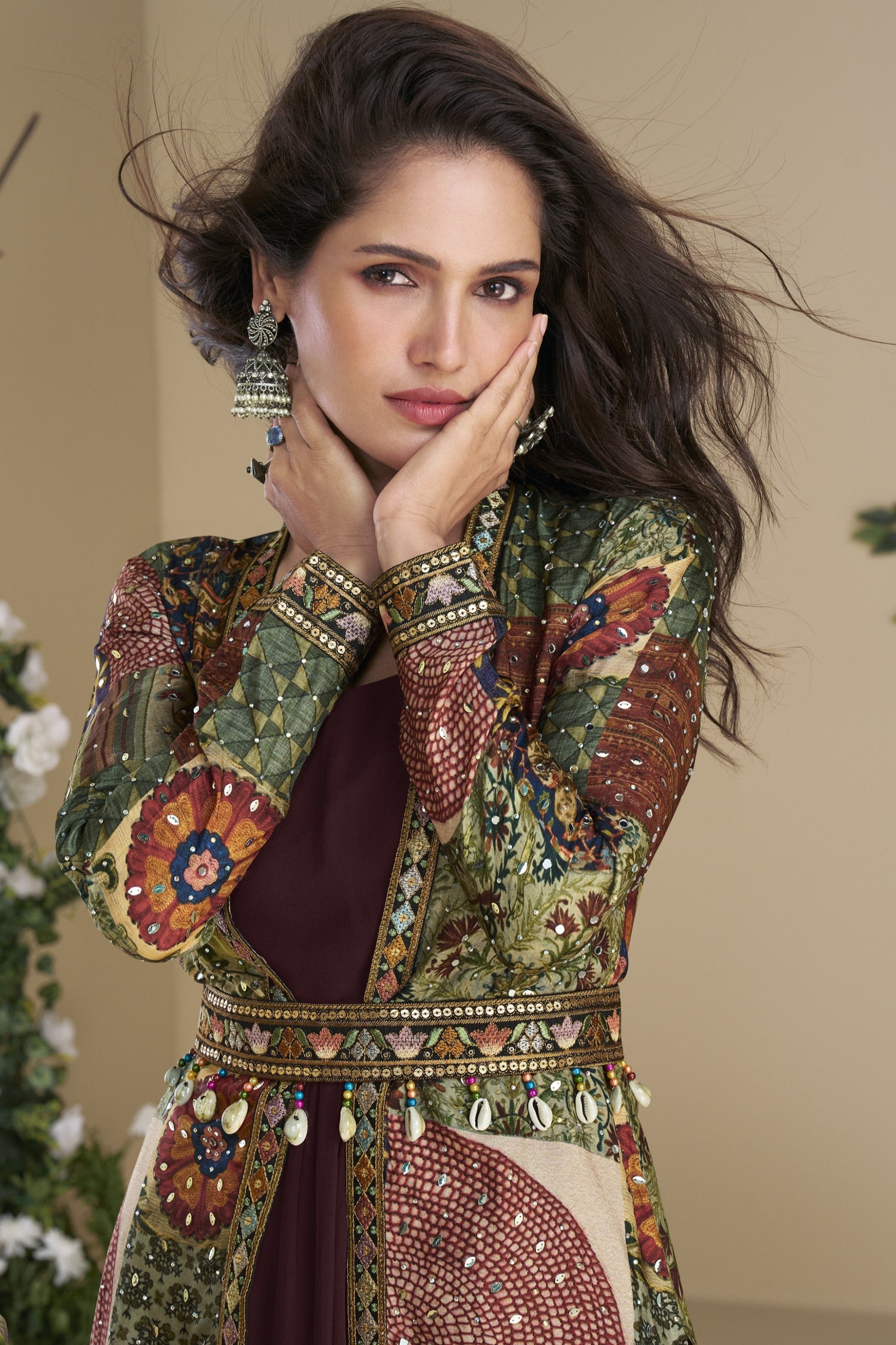 Dark brown Indo-Western Anarkali gown in silk fabric with embellished work, perfect for festive elegance.

