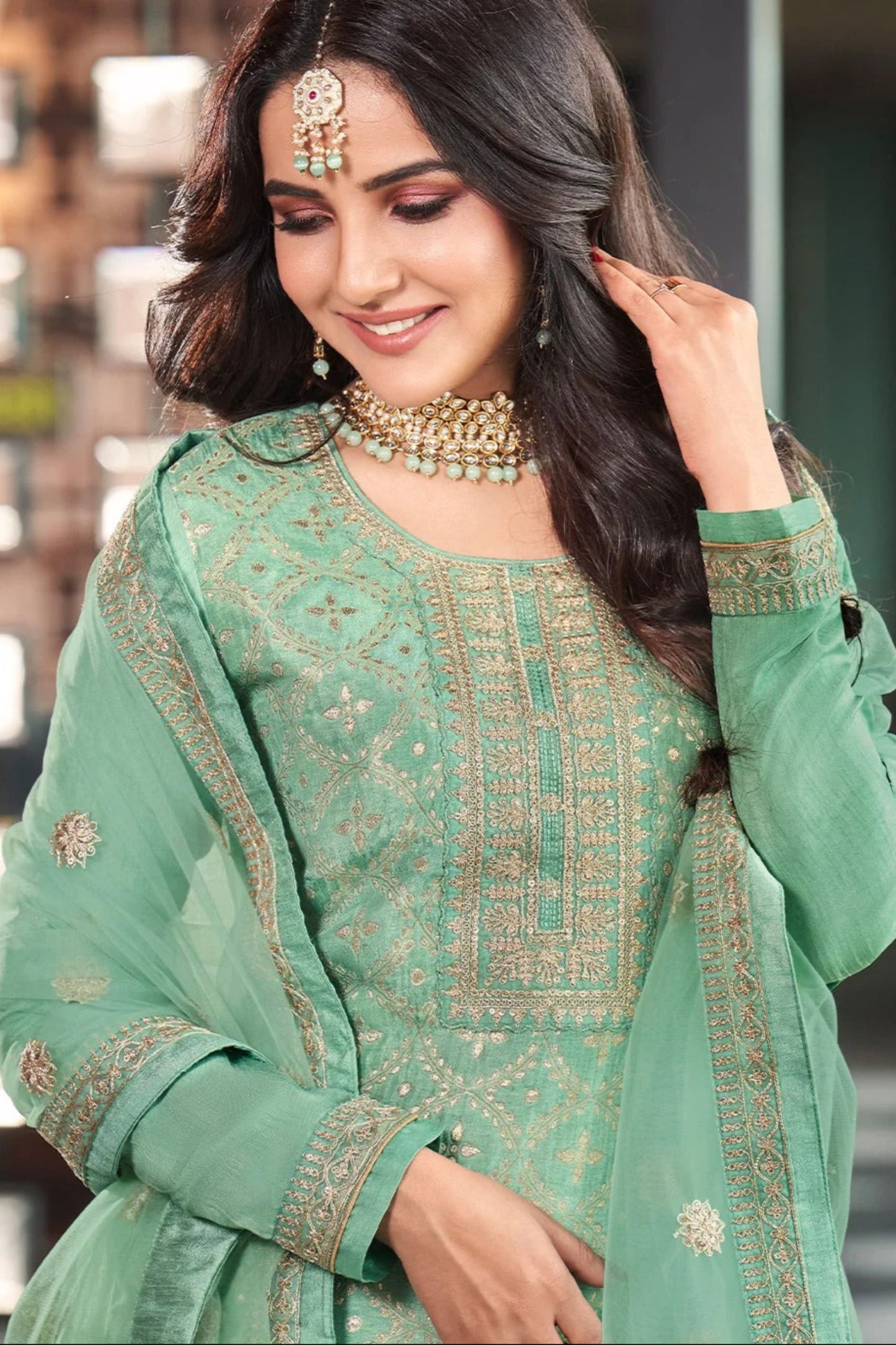 Women Wearing Pistachio Green Salwar Suit with Heavy Embroidery Work - Traditional Indian Wedding Outfit USA