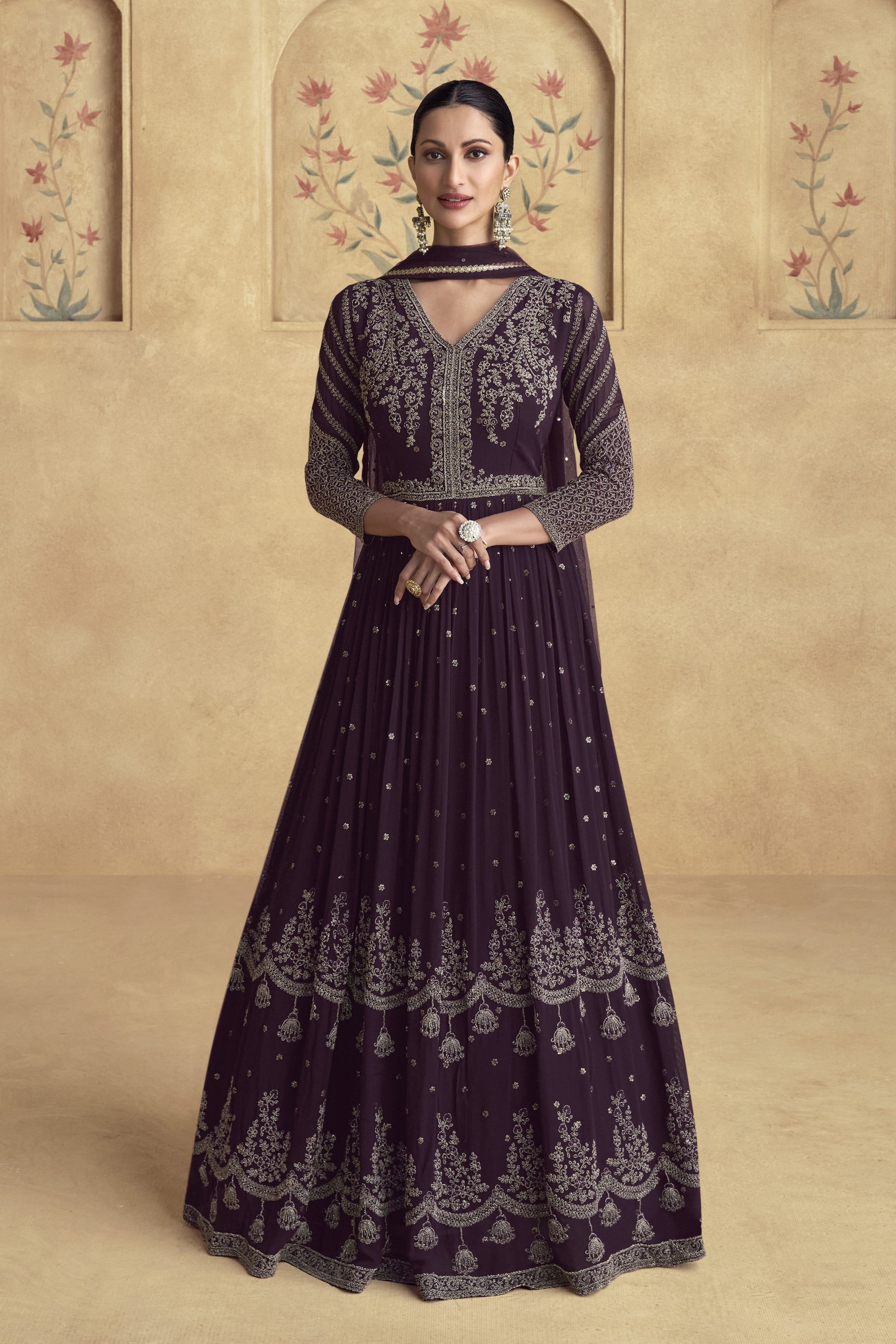 Lehenga and Anarkali gown in elegant traditional design, perfect for weddings and festive celebrations.
