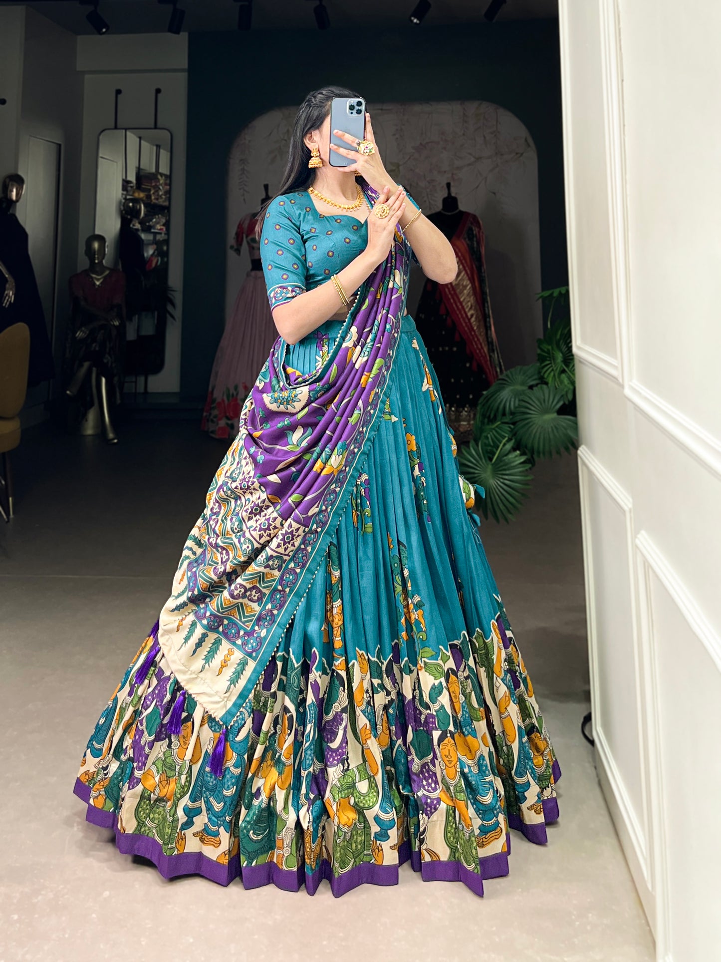 Blue Tussar silk lehenga with Kalamkari print work, featuring artistic patterns that add a graceful touch to festive wear.
Blue Tussar silk lehenga with Kalamkari print work, featuring artistic patterns that add a graceful touch to festive wear.

