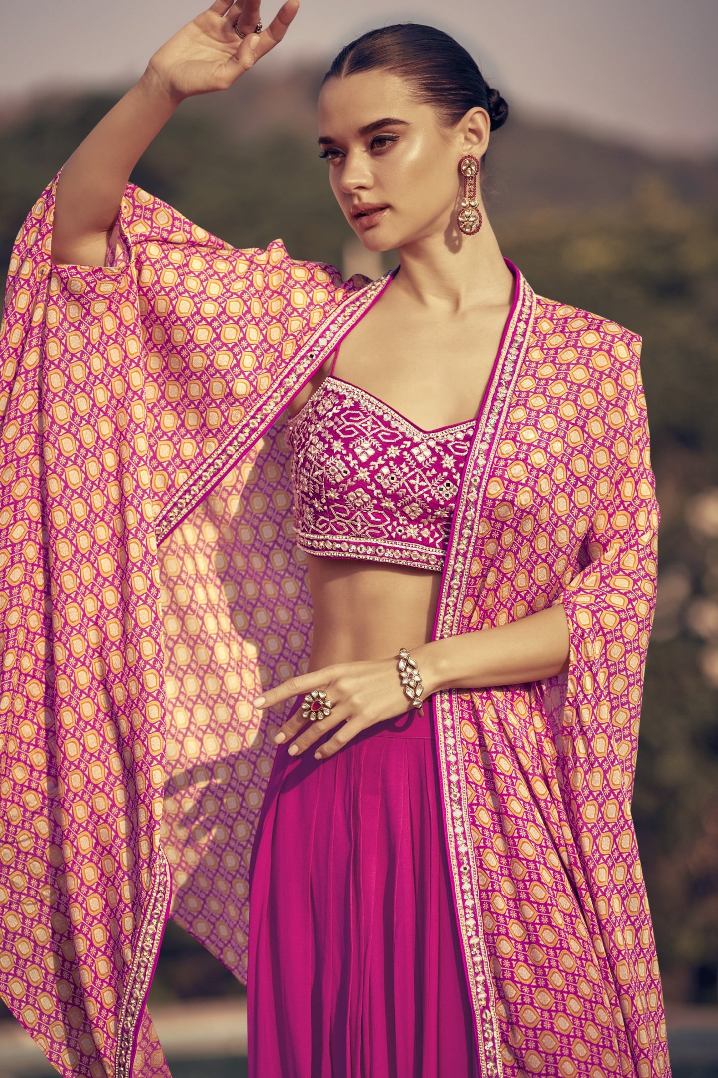 Pink color lehenga in Chinon silk fabric, featuring a soft flowy texture and elegant finish, perfect for festive and wedding occasions.
