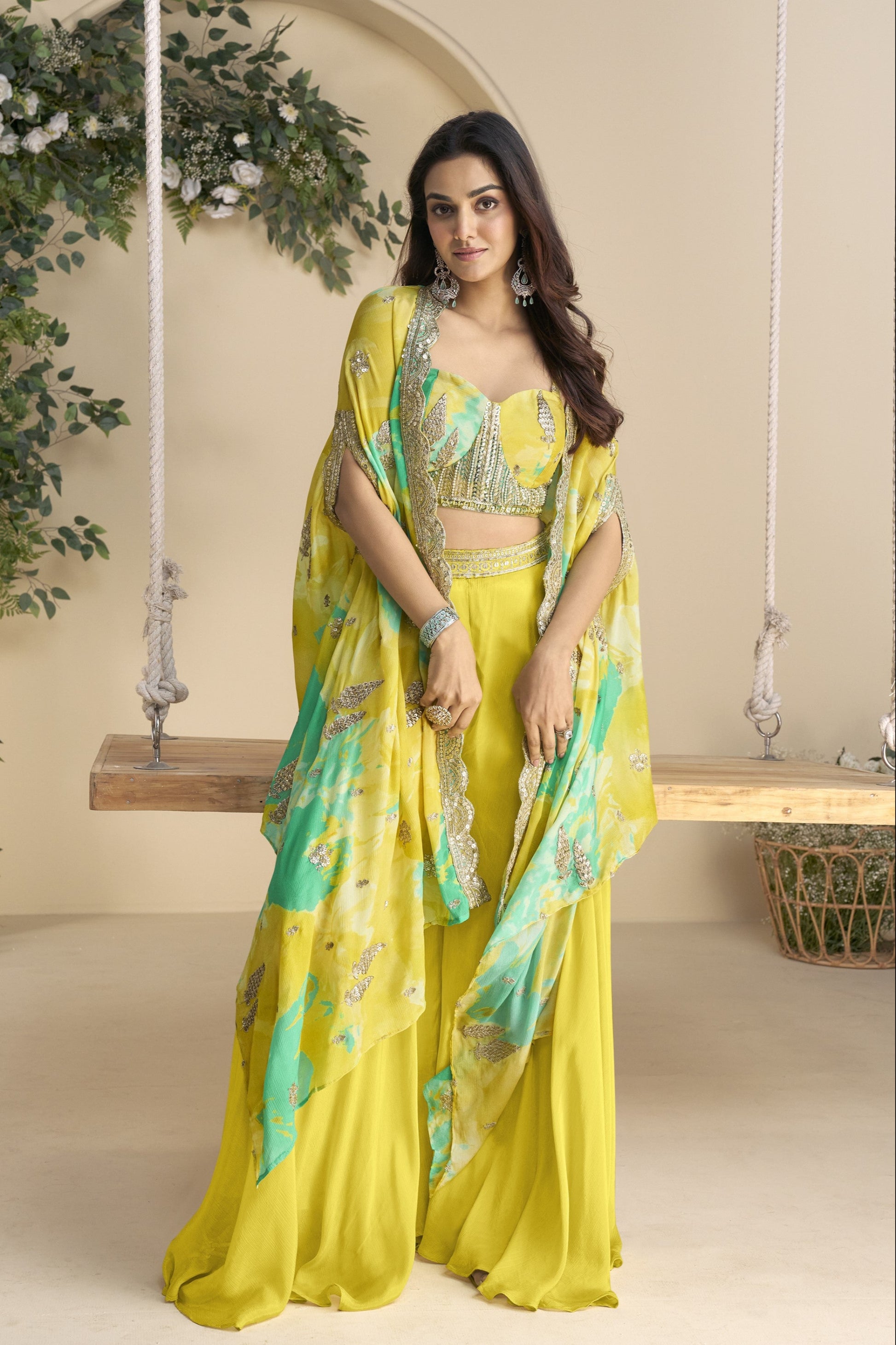 Yellow color lehenga in Chinon silk fabric with embroidery and embellished work, radiating vibrant charm ideal for festive and celebratory occasions.
