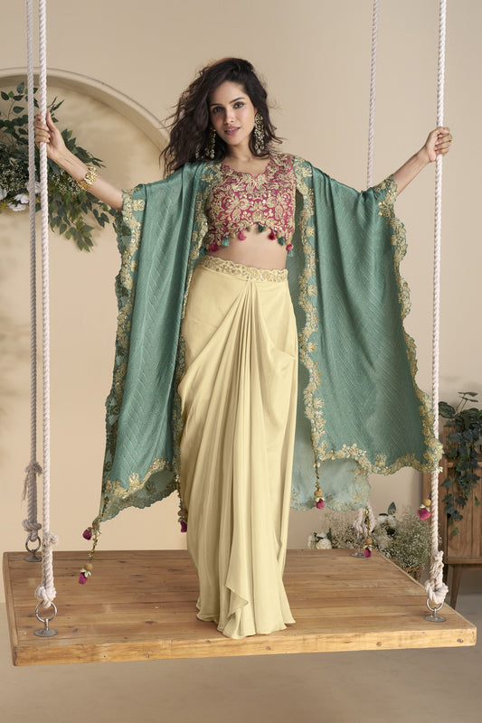 Beige color lehenga in Chinon silk fabric with embroidery and embellished work, offering a graceful and elegant look perfect for weddings and festive occasions.
