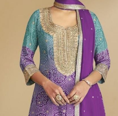 Full View Of Glamorous Purple Sharara Suit With Soft Net Dupatta