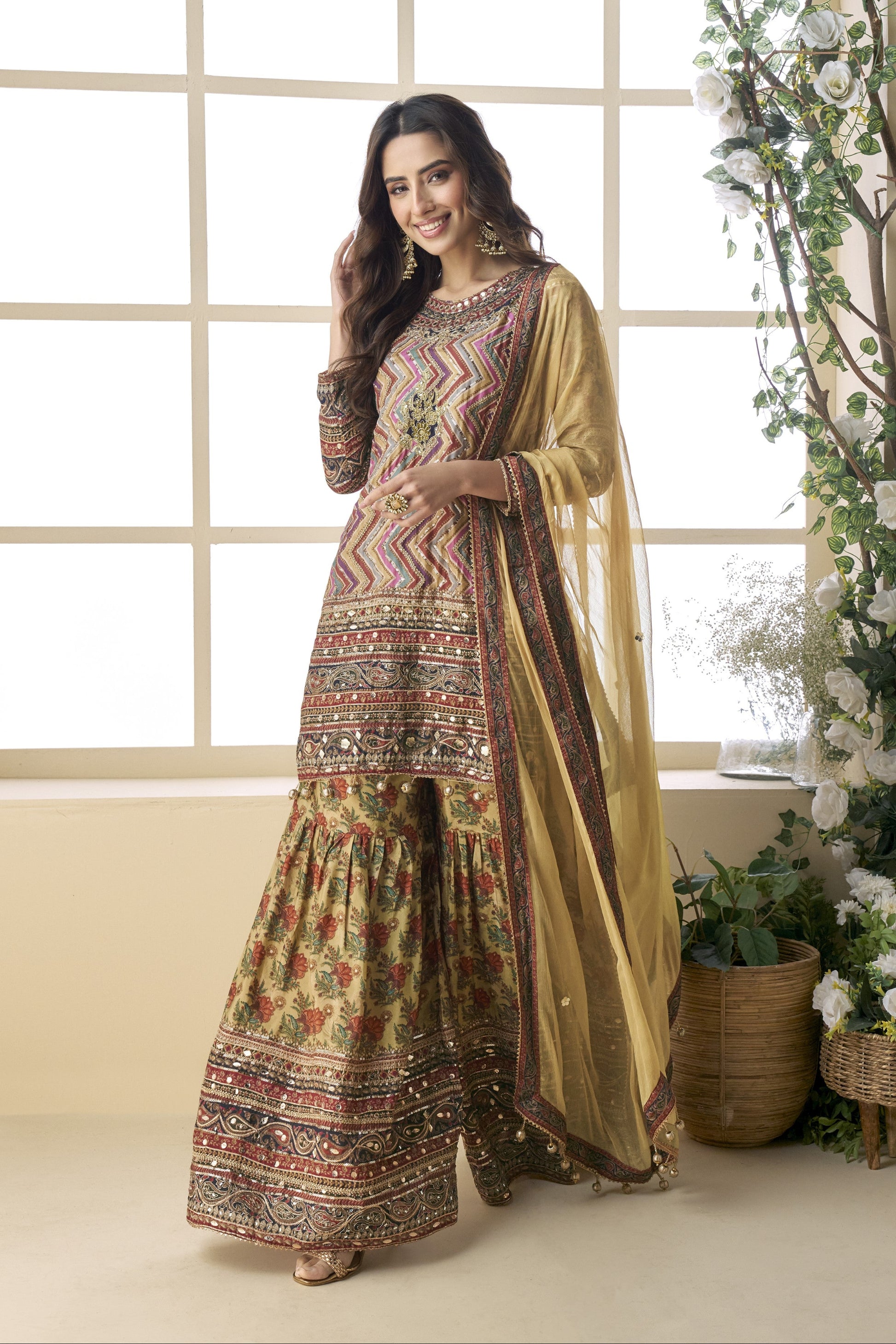 Light yellow color palazzo suit in viscose fabric with hand zari and embellished work, bringing a soft, radiant elegance to festive and special occasions.
