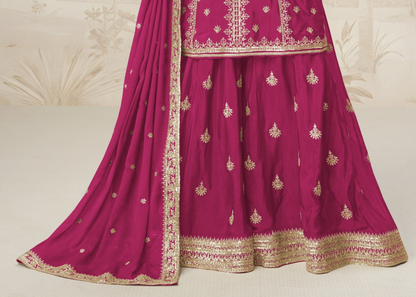 Pink color palazzo suit with embroidery work, offering a soft and graceful look ideal for festive and traditional events.

