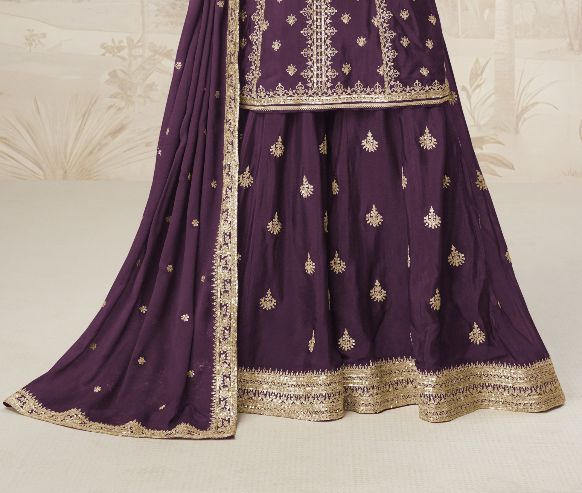 Wine color palazzo suit with embroidery work, exuding rich elegance and timeless charm, perfect for festive celebrations and special occasions.
