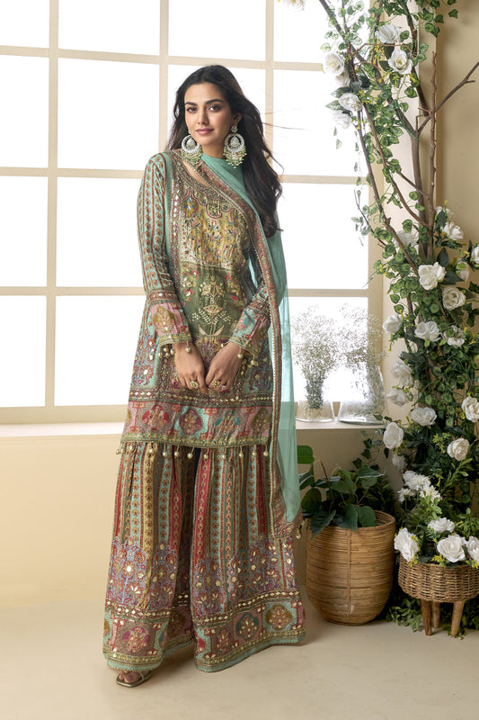 Palazzo suit in viscose fabric with hand zari and embellished work, offering a rich and elegant look ideal for festive and traditional occasions.
