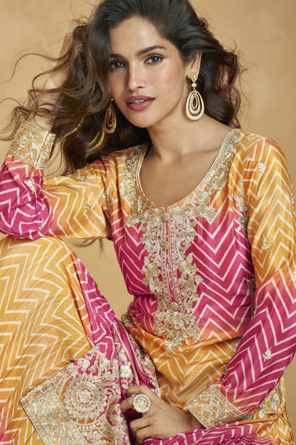 Lovely pink and yellow outfit with vibrant tones, perfect for festive celebrations, haldi functions, and cheerful occasions.

