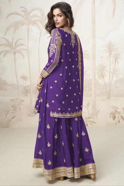 Purple color palazzo suit with embroidery work, showcasing a regal and elegant appeal ideal for festive and traditional celebrations.
