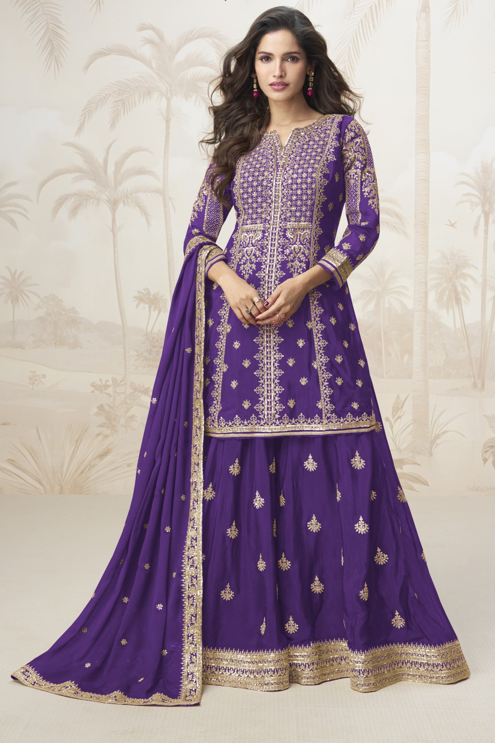 Purple color palazzo suit with embroidery work, showcasing a regal and elegant appeal ideal for festive and traditional celebrations.
